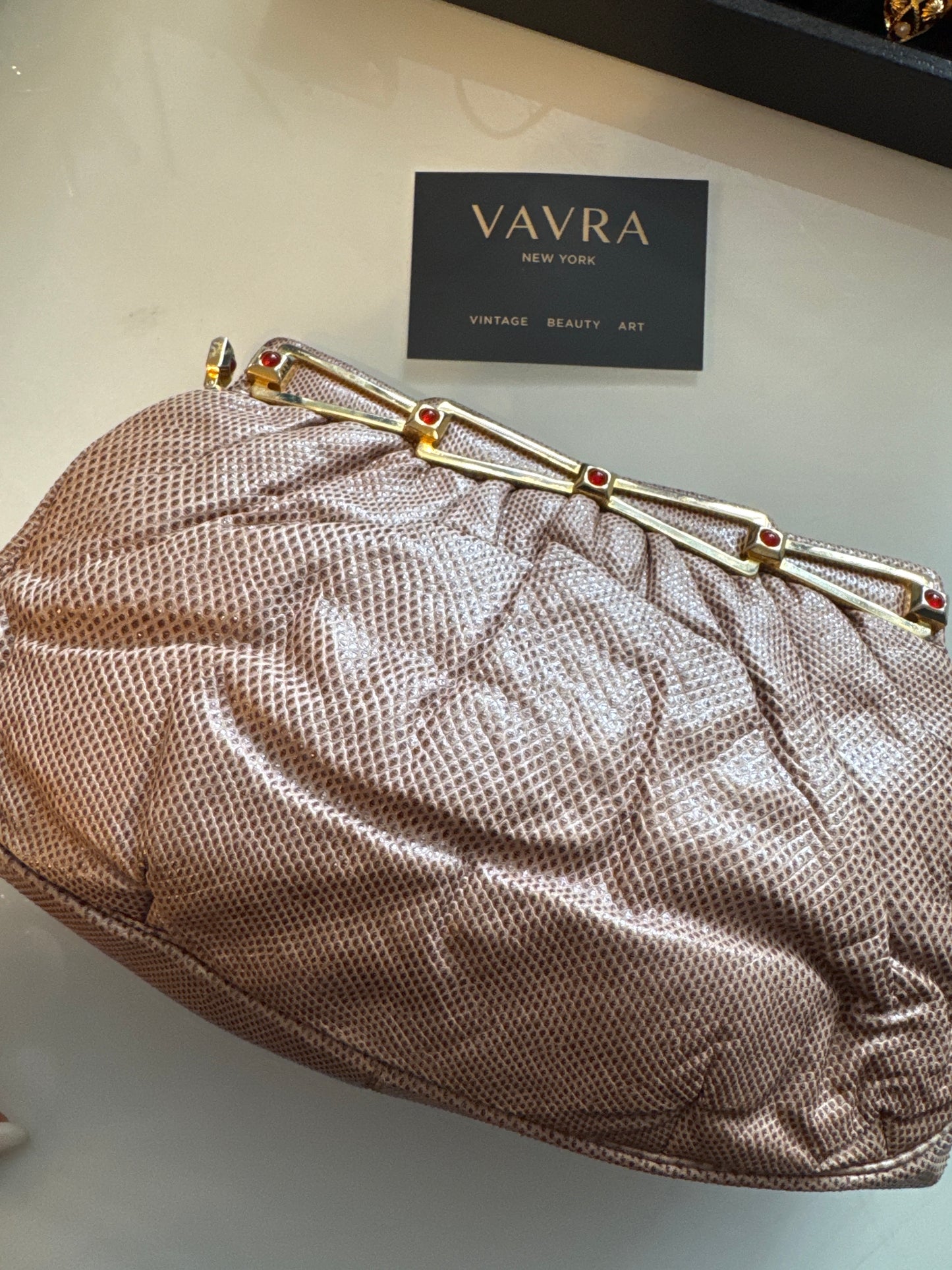 Beautiful vintage, Judith Leiber water snake clutch bag in beige with gold hardware and red cabochons. Comes with the shoulder strap.