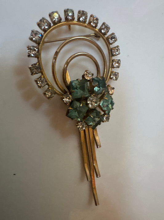 1930s articulated dangling pendant with aquamarine and clear rhinestones