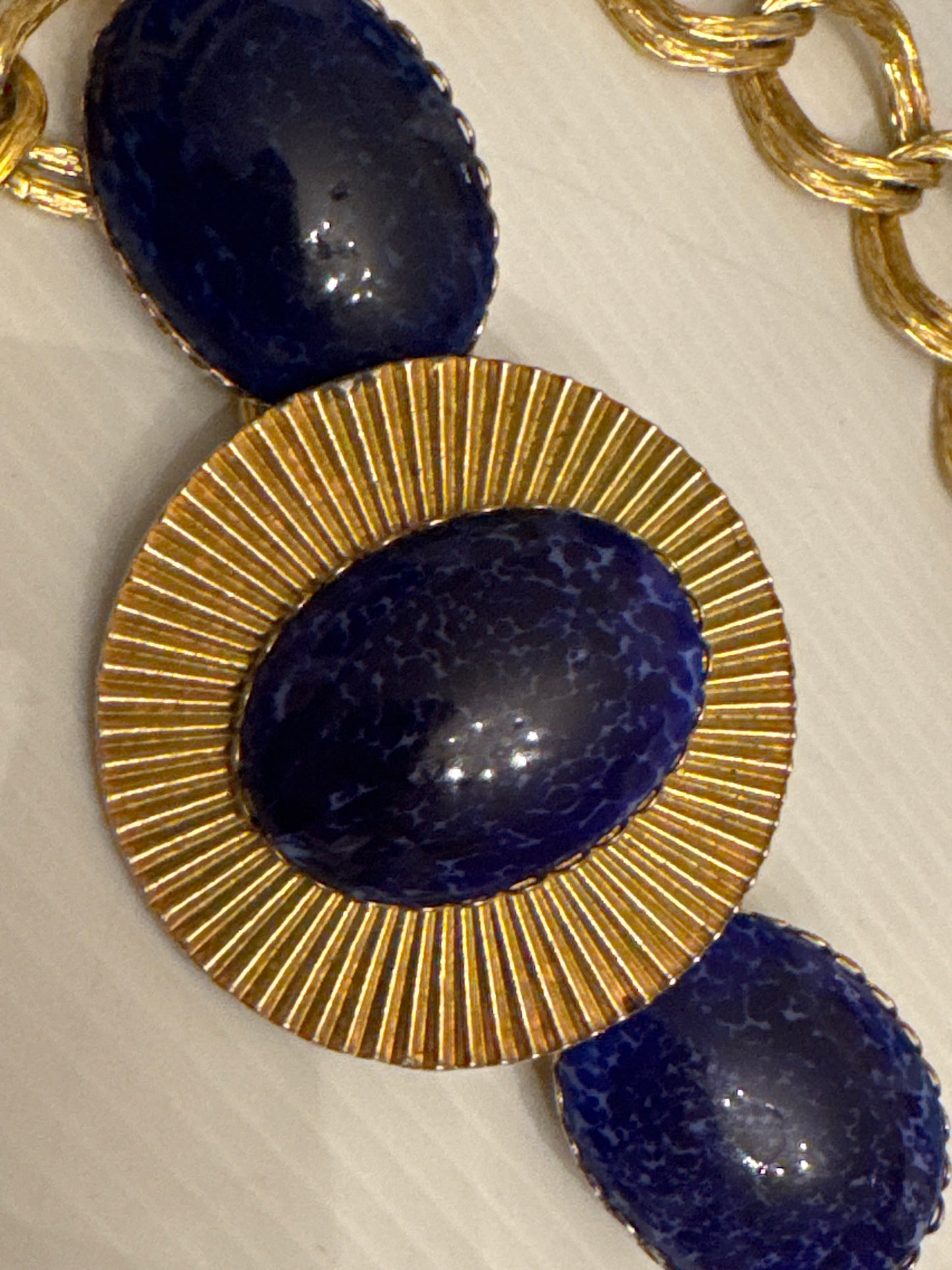 Beautiful 1970s vintage gold tone belt with blue cabachon stones