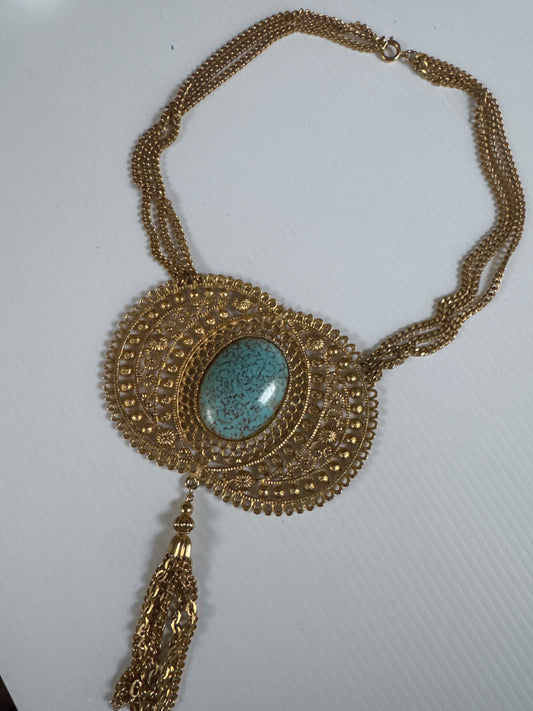 Vintage 1960s jumbo gold tone, triple chain pendant necklace with turquoise stone and fringe dangling