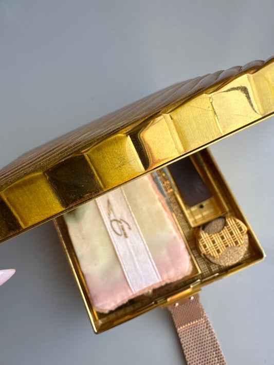 1930s gold bracelet MINAUDIERE. Two sided for Makeup and cigarettes. Signed Evans. Tom