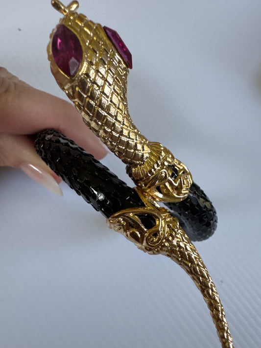 1970s Whiting & Davis snake wrap bracelet / arm cuff with gold tone and amethyst colored rhinestone eyes