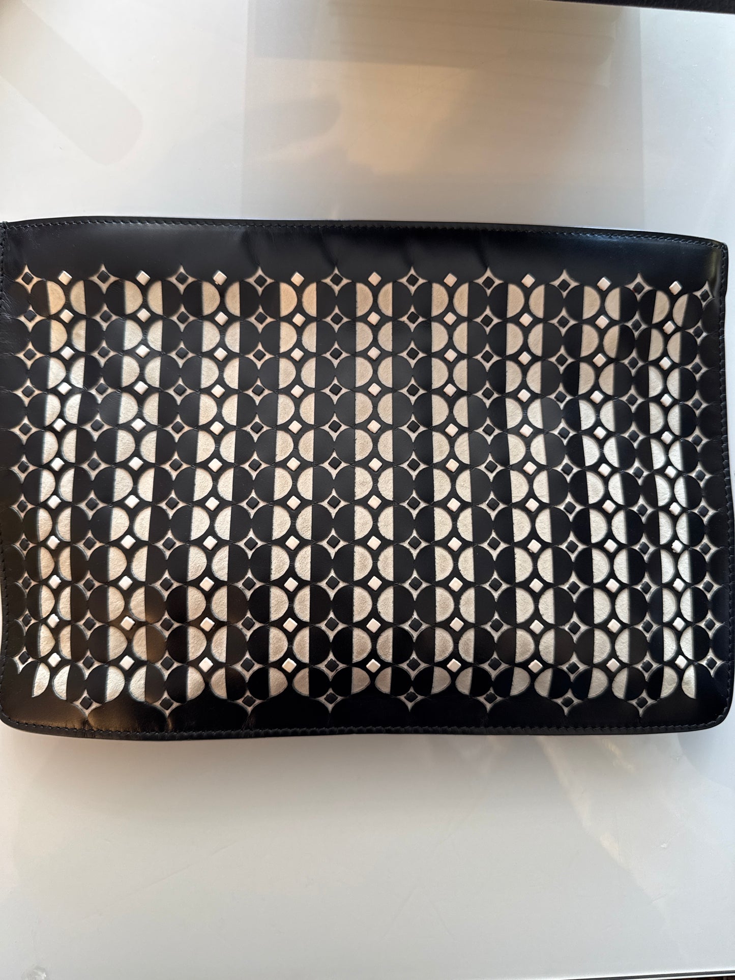 Vintage ALAIA black-and-white cut out, clutch with zip top and original dust bag