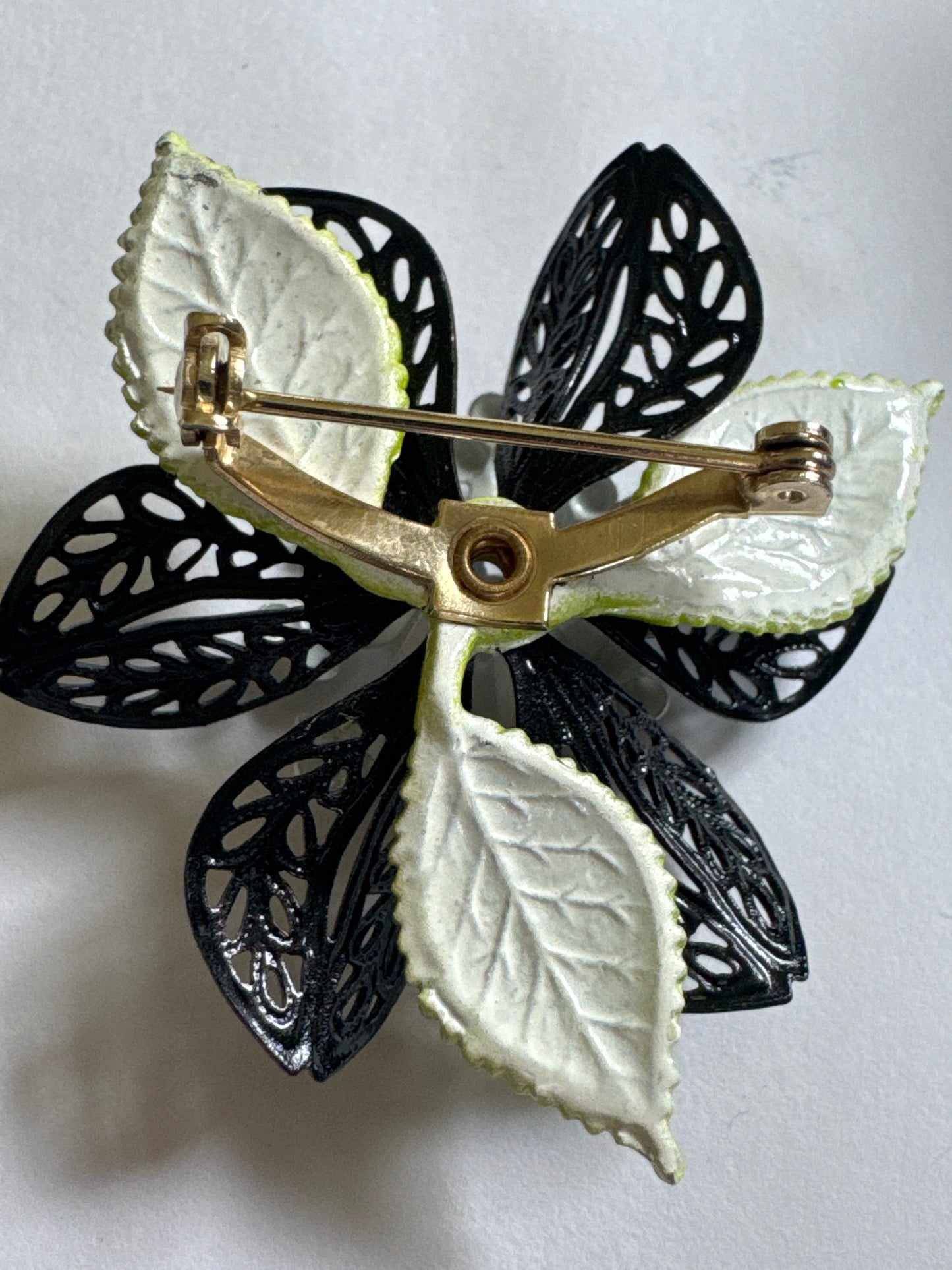 1960s black white and green enamel brooch