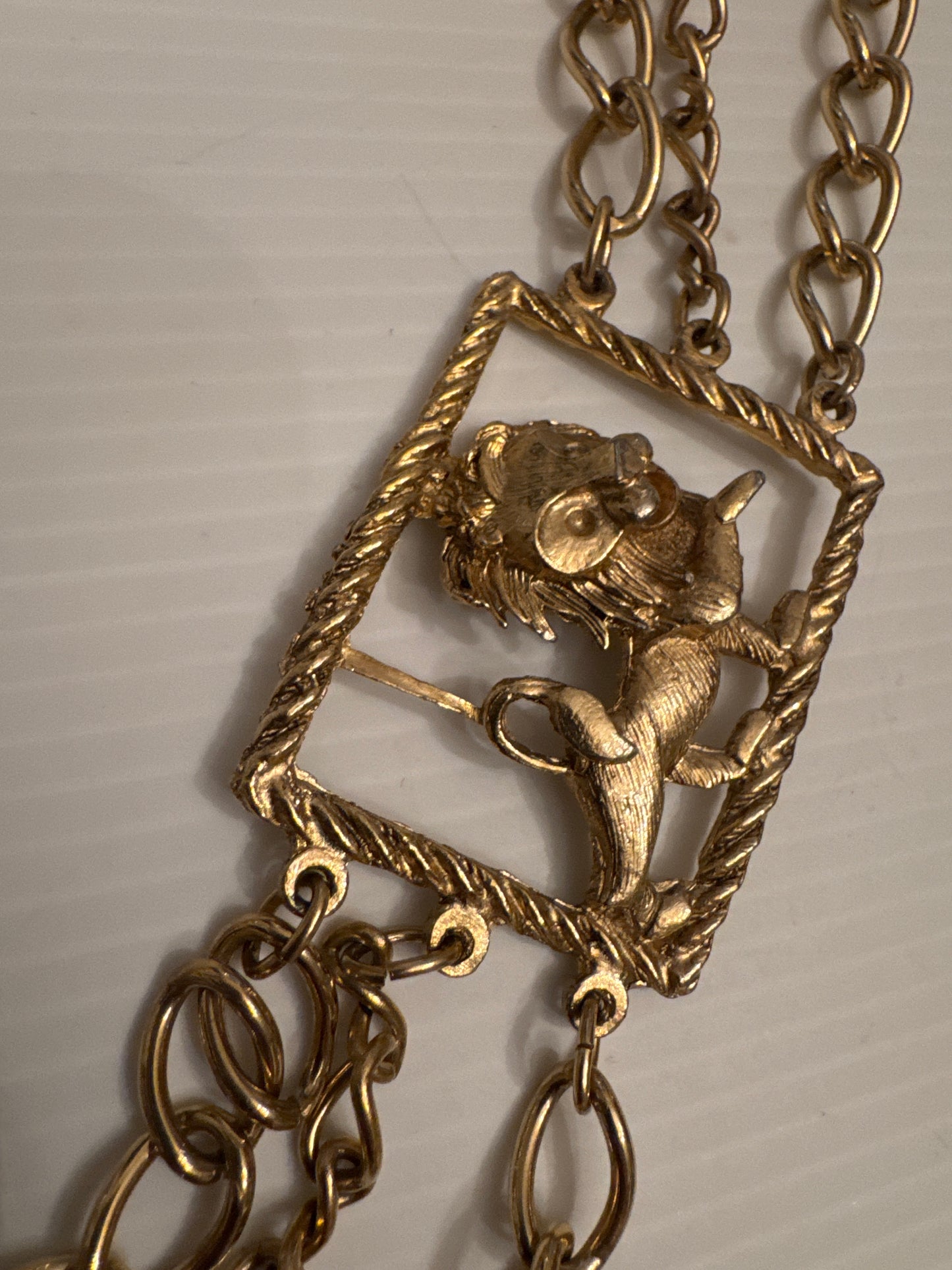 Vintage 1970s gold tone, lion embellished belt