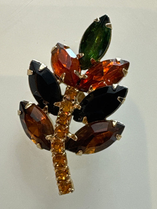 adorable 1950s fall colors Rhine stone brooch in the shape of a leaf