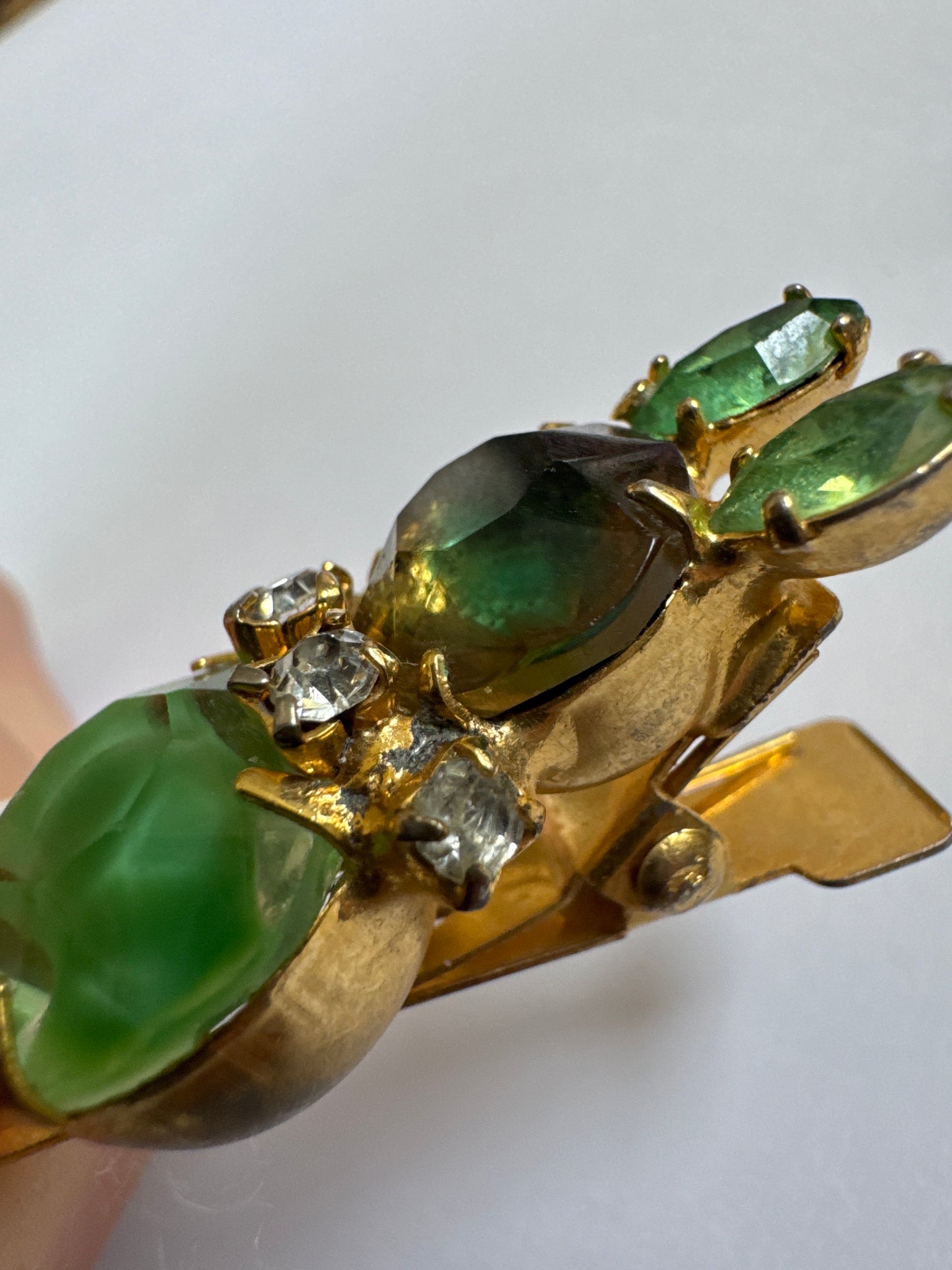 A rare mid-century Czech figural mouse clip, featuring apple greenhand-set glass stones and whimsical post-war design