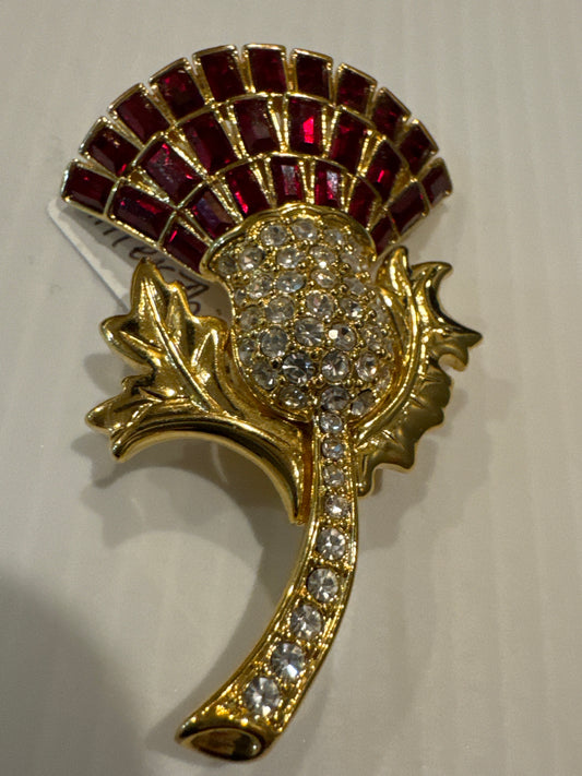 Gorgeous vintage signed Nolan Miller with red and clear rhinestones flower brooch