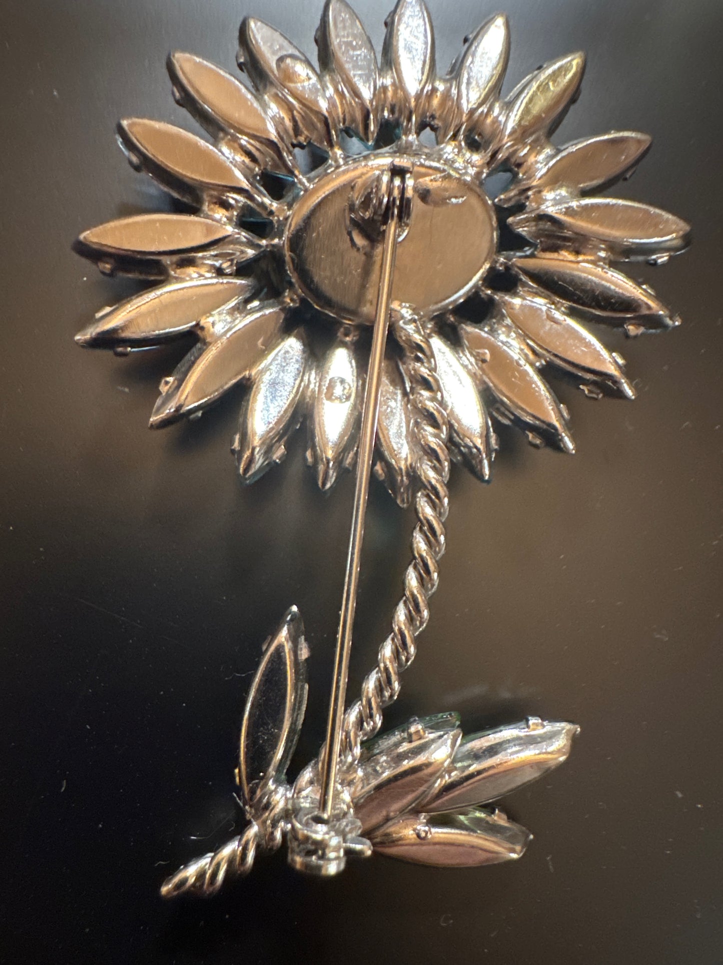 Stunning flower brooch with blue and green rhinestones
