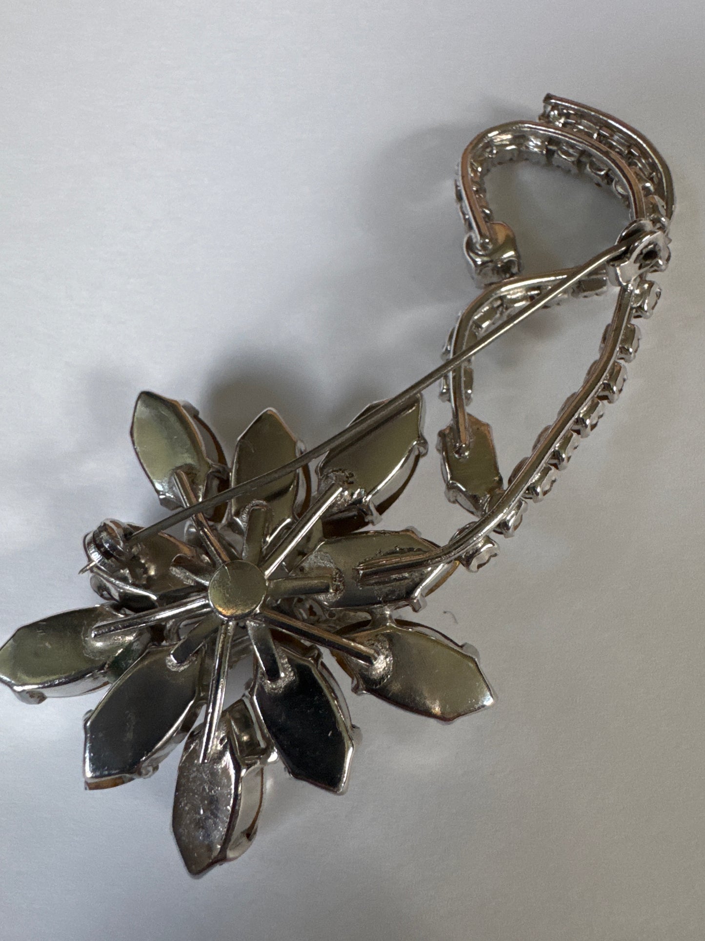 1940s sparkly flower brooch with layered clear rhinestones