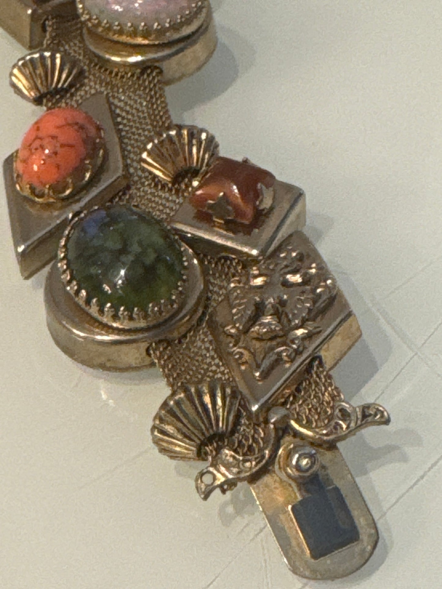 Stunning wire gold tone slider bracelet with over 10 charms. Sourced in Paris.