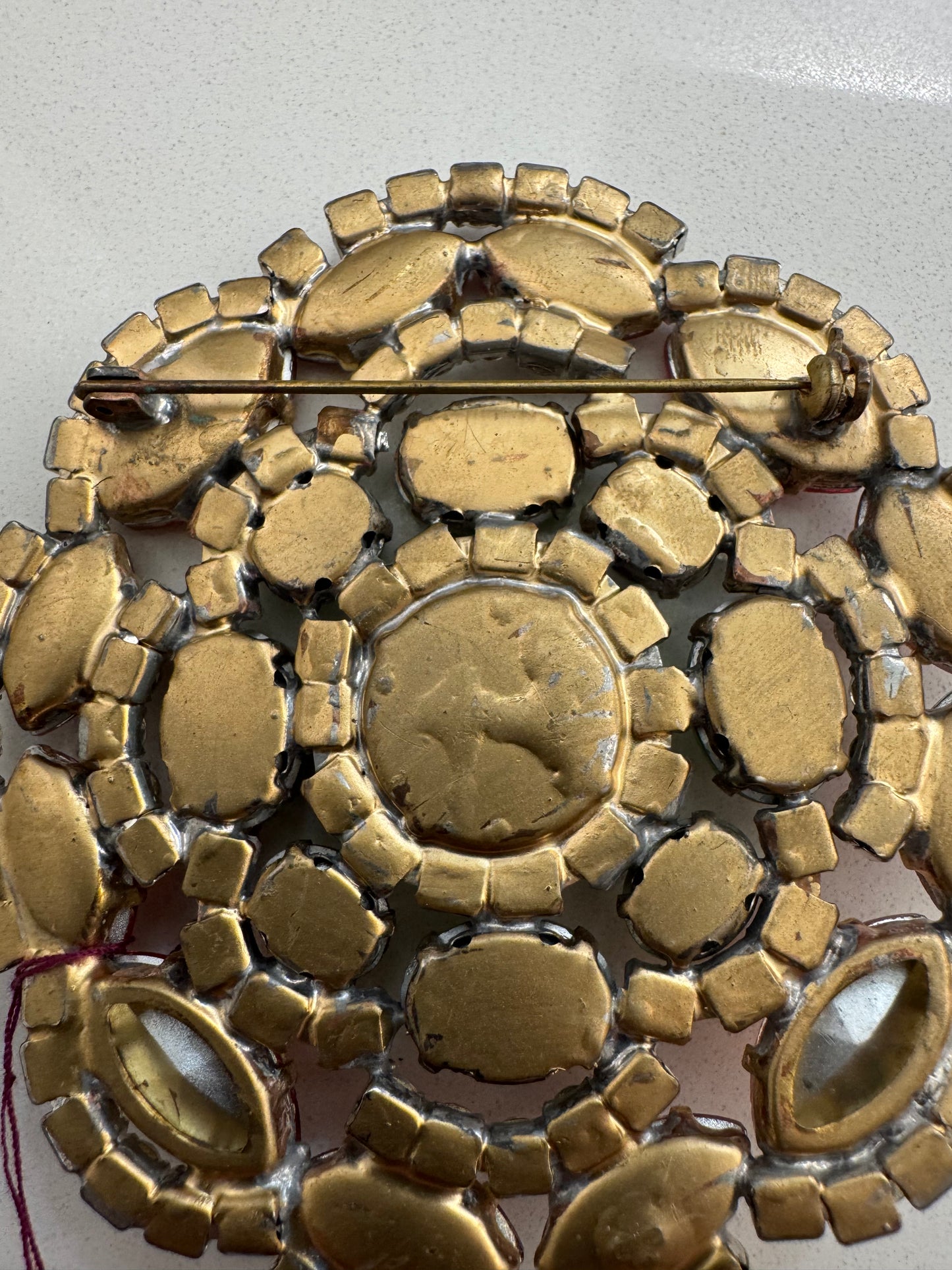 Vintage jumbo rhinestone brooch with orange, green and clear rhinestones