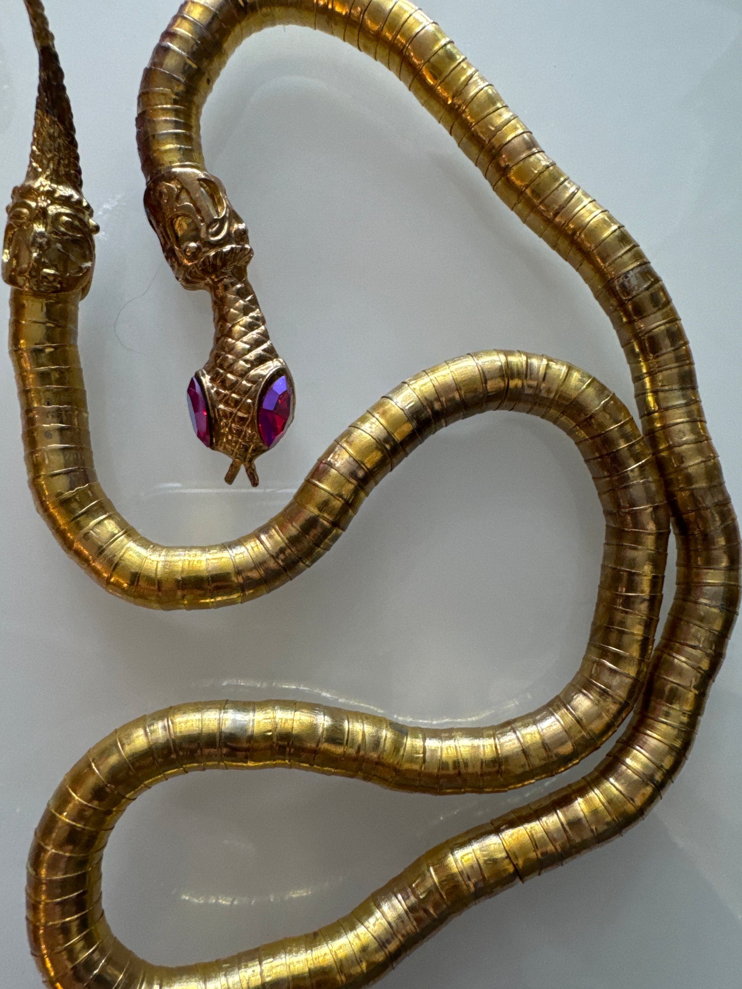 Vintage gold tone, moldable snake necklace/bracelet with rhinestone eyes