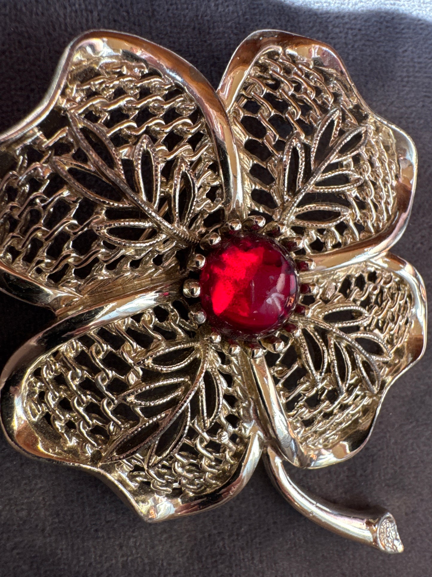 Signed vintage EMMONS jumbo flower brooch in gold tone with red center stone