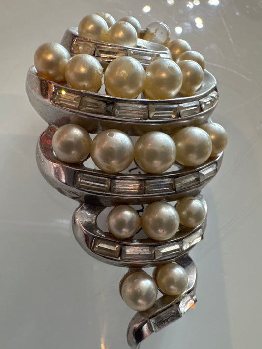 Signed Trifari elegant vintage, 3-D silver tone with pearl and rhinestone swirl brooch.