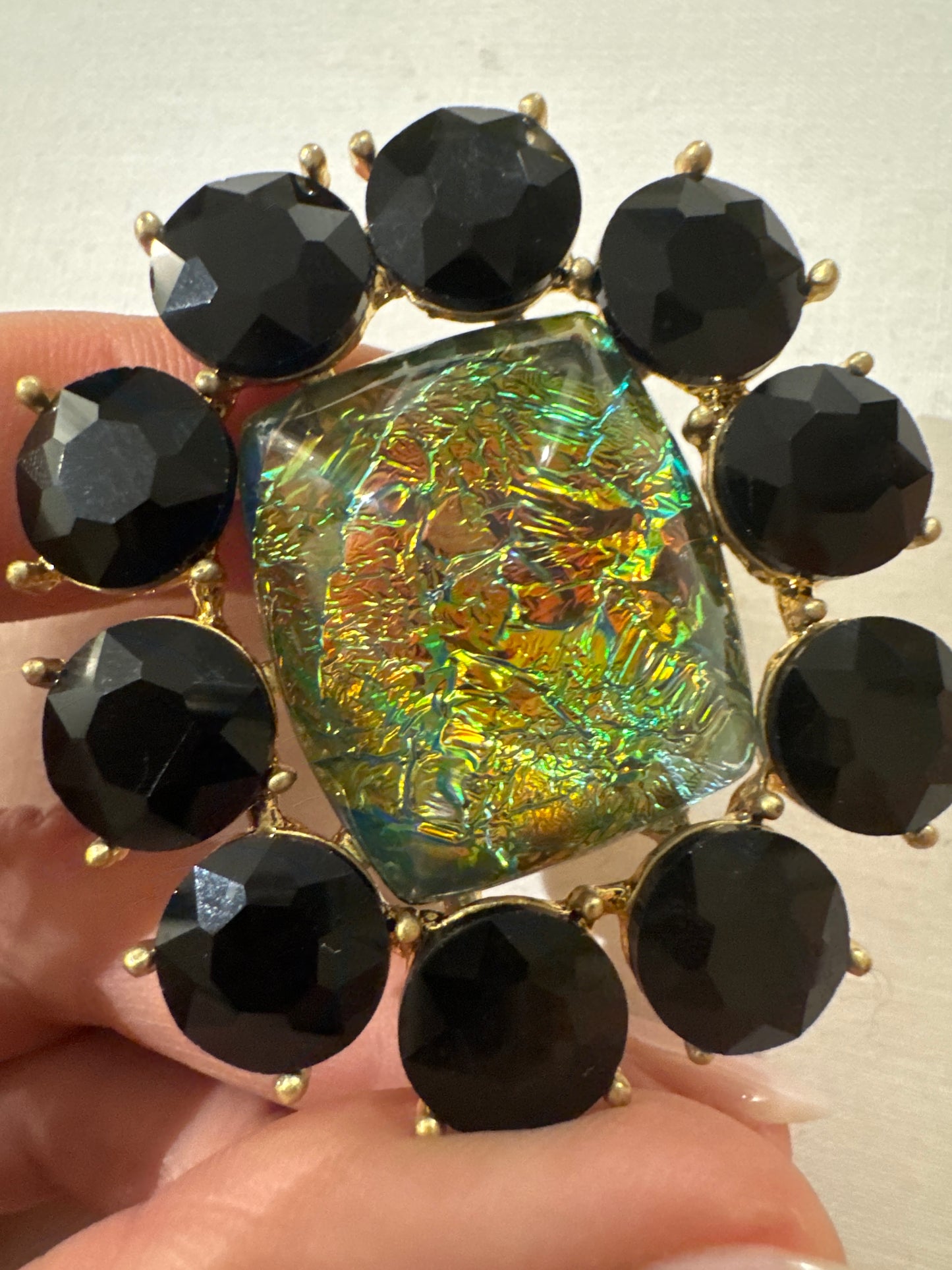 Fun, jumbo vintage flowering with black rhinestones and green moonstone Centerstone. Sourced in Paris.