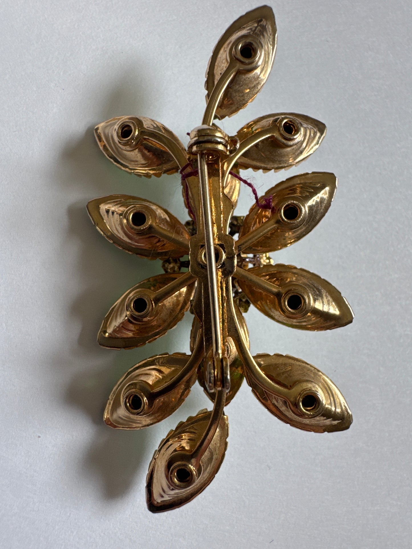 Late 1940s/early 50s unsigned JUDY LEE green and gold tone bar brooch. Most of Judy Lee's brooches are unsigned due to rivet construction.