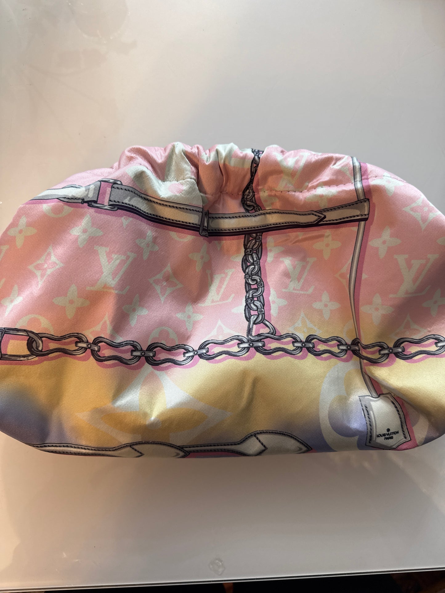 Designer silk scarves reimagined as Crossbody/clutch bags. Size large.