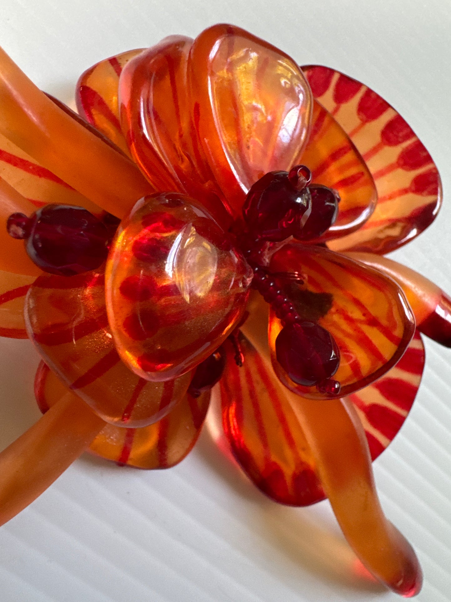 1960s orange, movable lucite flower brooch