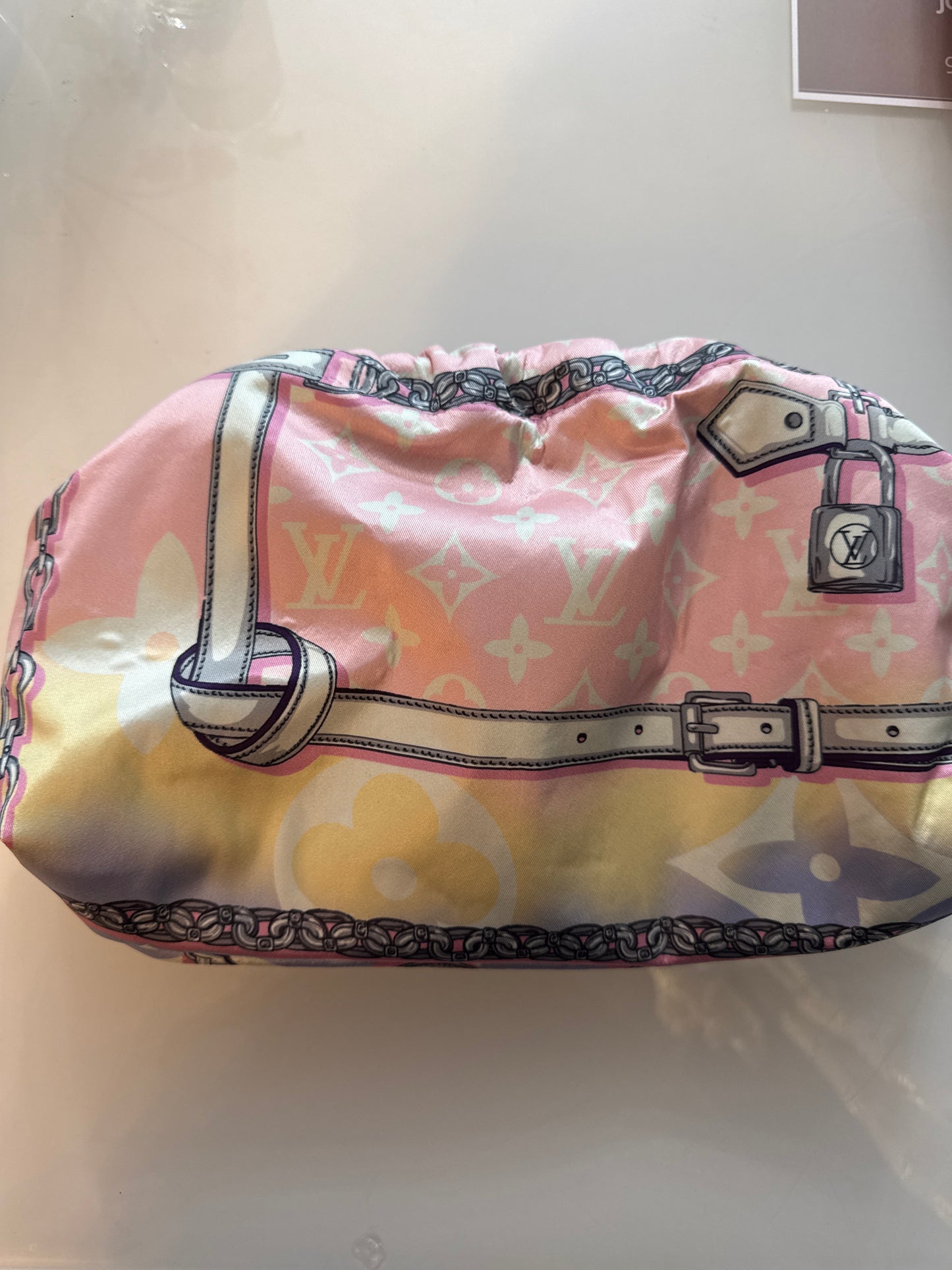 Designer silk scarves reimagined as Crossbody/clutch bags. Size large.