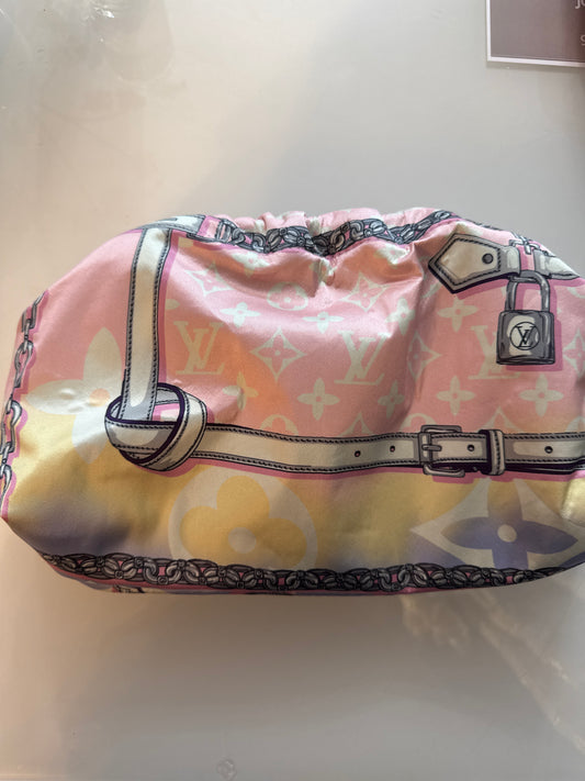 Designer silk scarves reimagined as Crossbody/clutch bags. Size large.