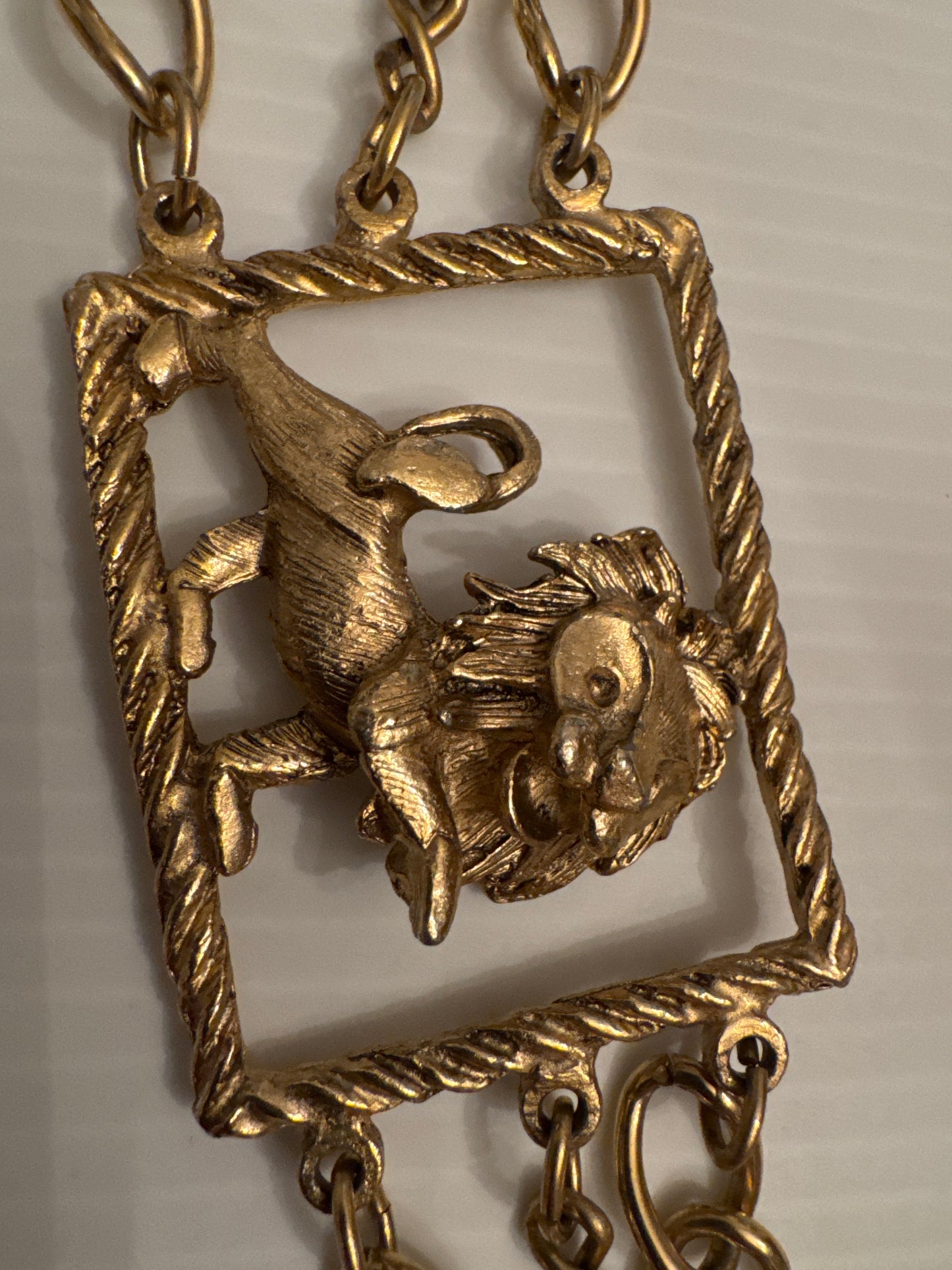 Vintage 1970s gold tone, lion embellished belt