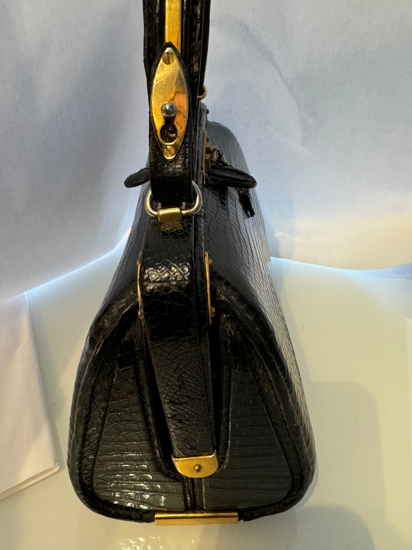 Vintage Lederer made in France black alligator bag with gold hardware late 1940s. Included original mirror in leather case