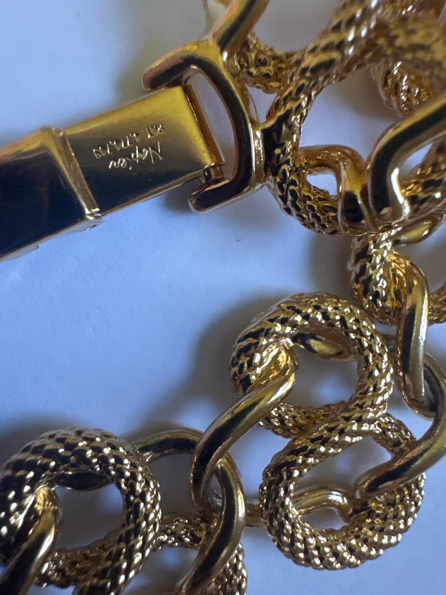 1980s swirl S link chain in gold tone signed NAPIER
