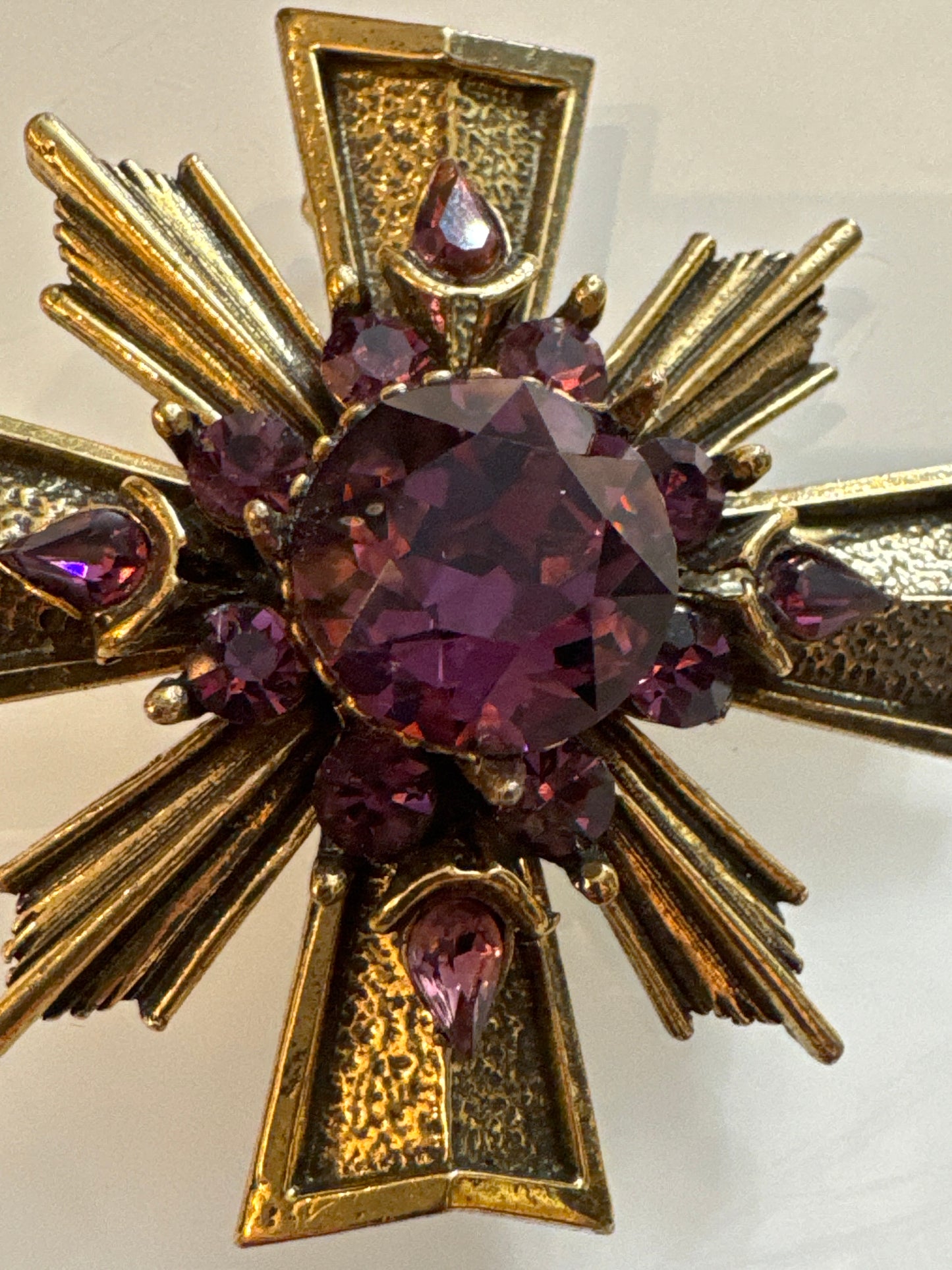 signed Zentall 1990s maltese cross brooch with amethyst colored stones