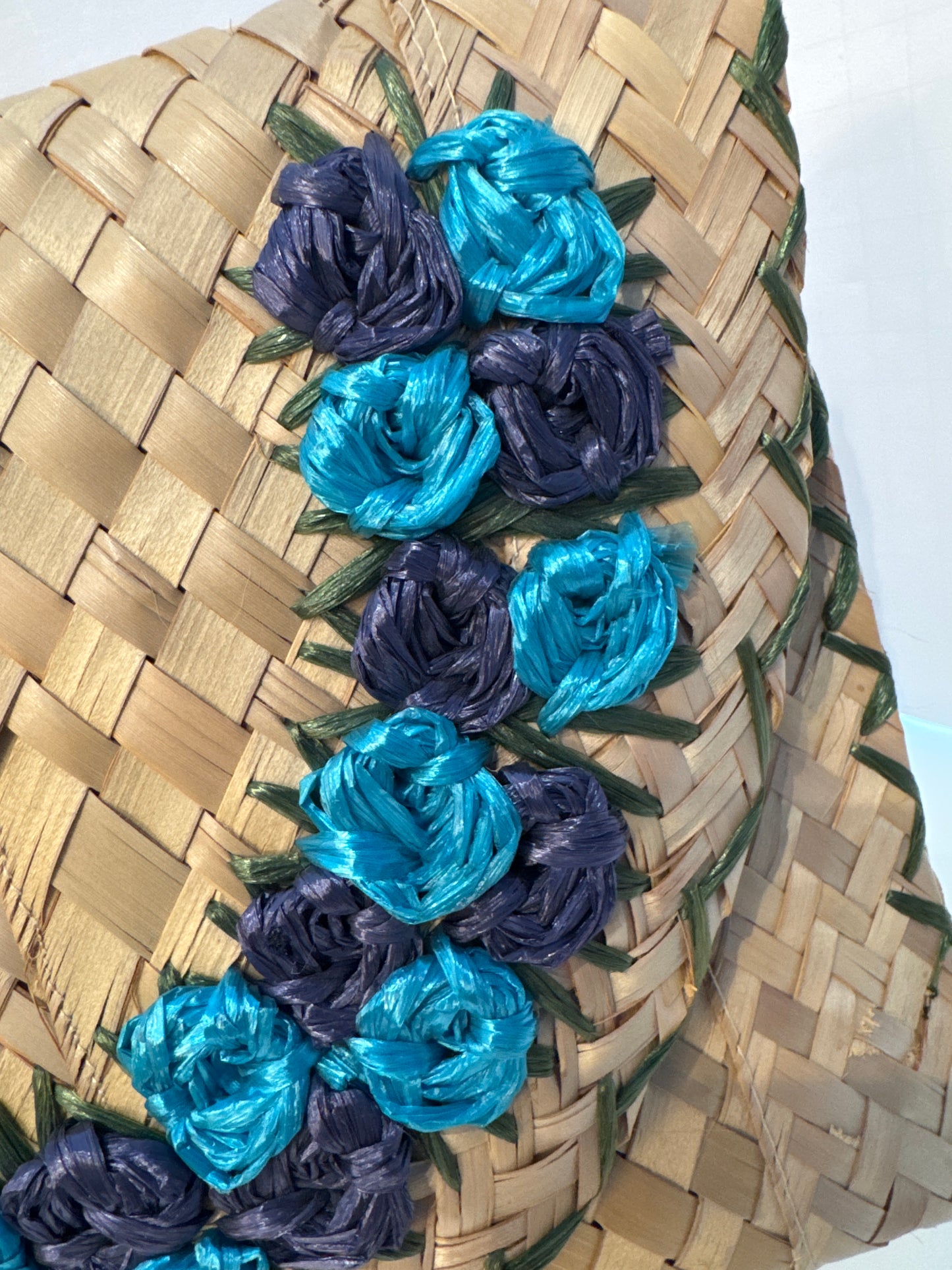 Adorable 1950s wicker envelope clutch with navy and turquoise flower embroidery