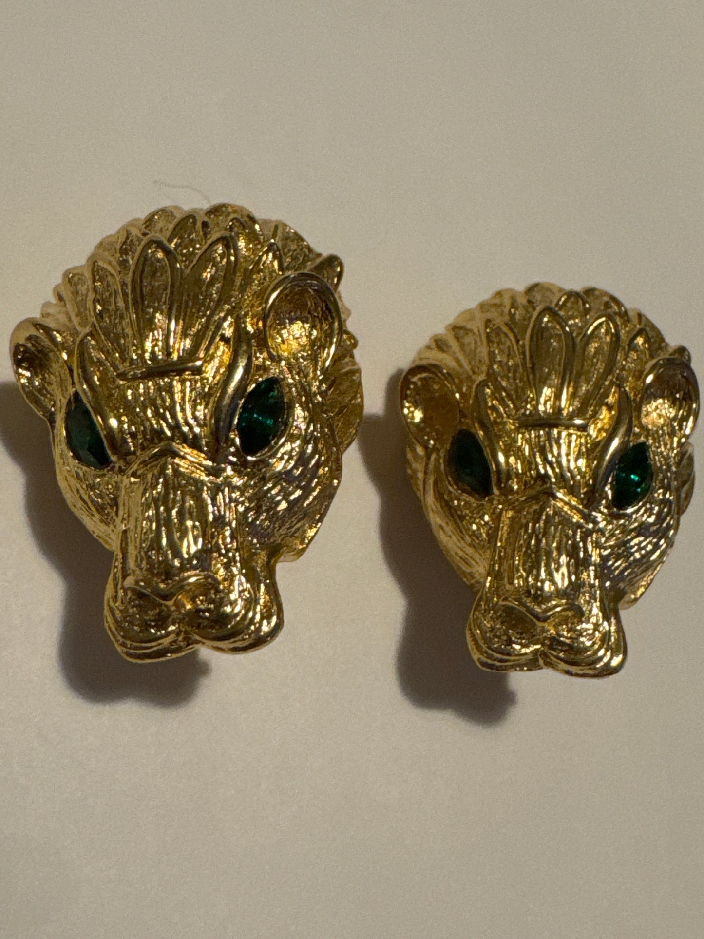 Beautiful signed Les Bernard gold tone clip on earrings in the 1960s. Green rhinestone eyes. Road