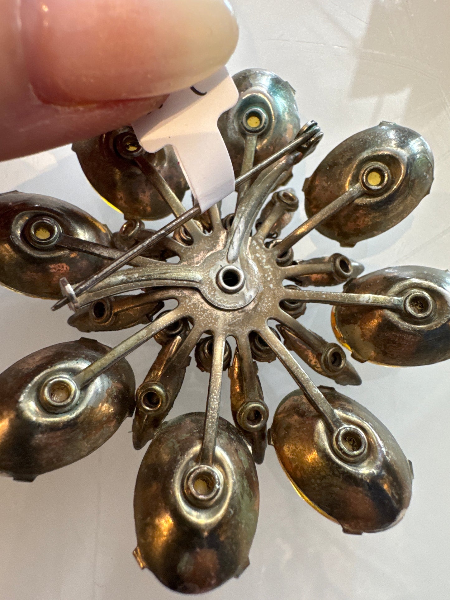 Stunning 1940s flower brooch with olive watermelon stones