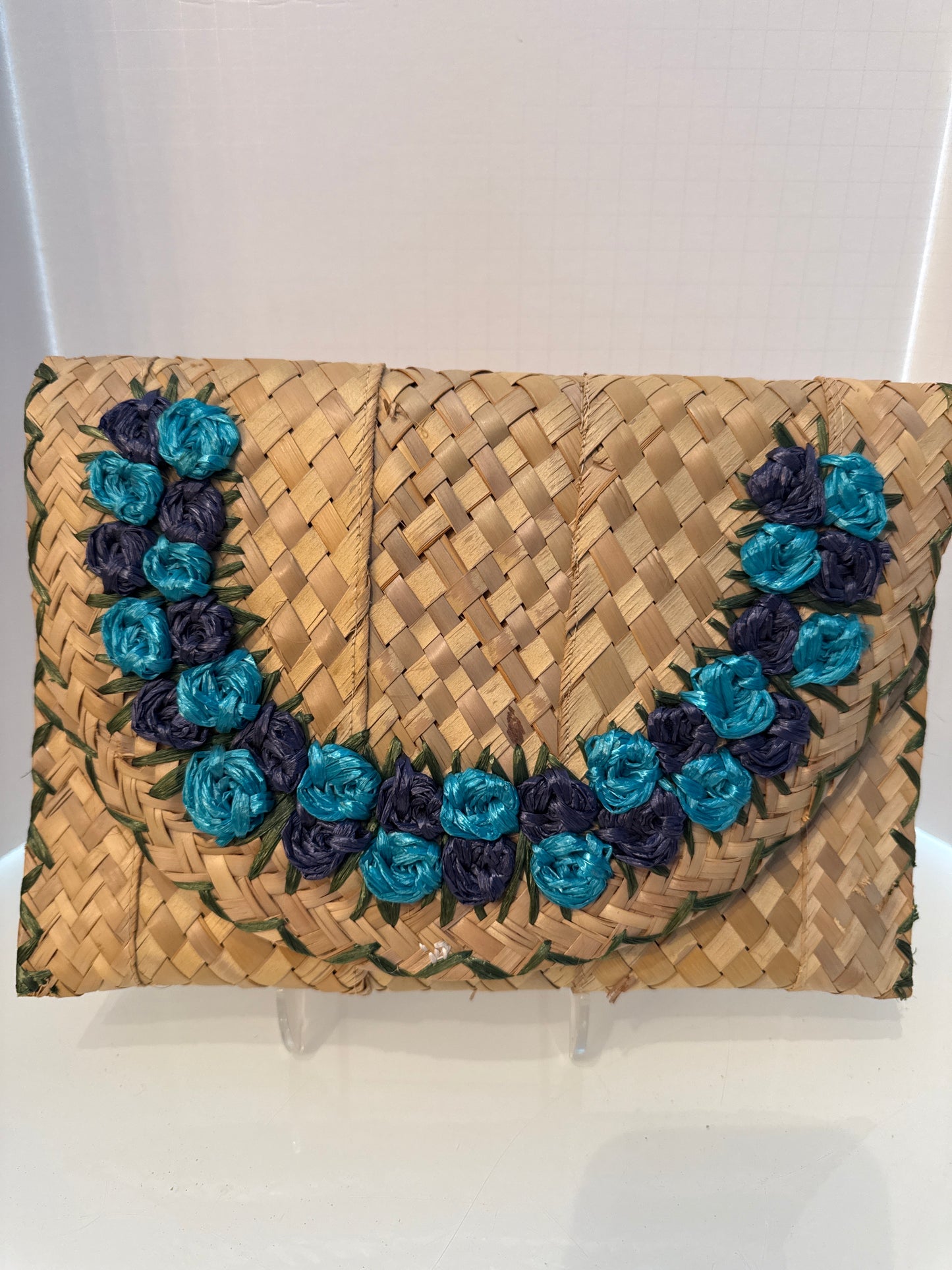 Adorable 1950s wicker envelope clutch with navy and turquoise flower embroidery