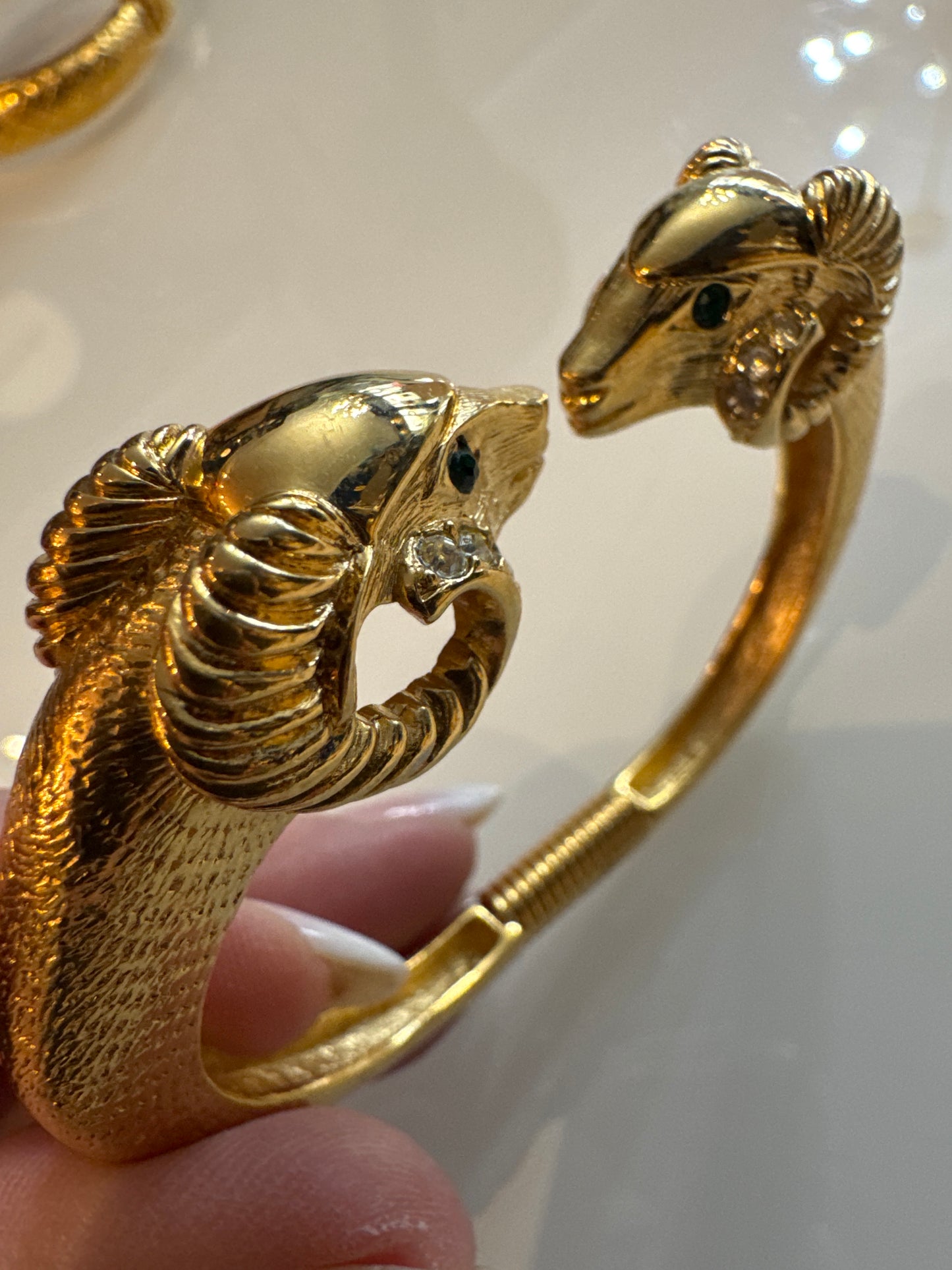 KJL for Avon Ram bracelet in gold tone with rhinestones. NYC