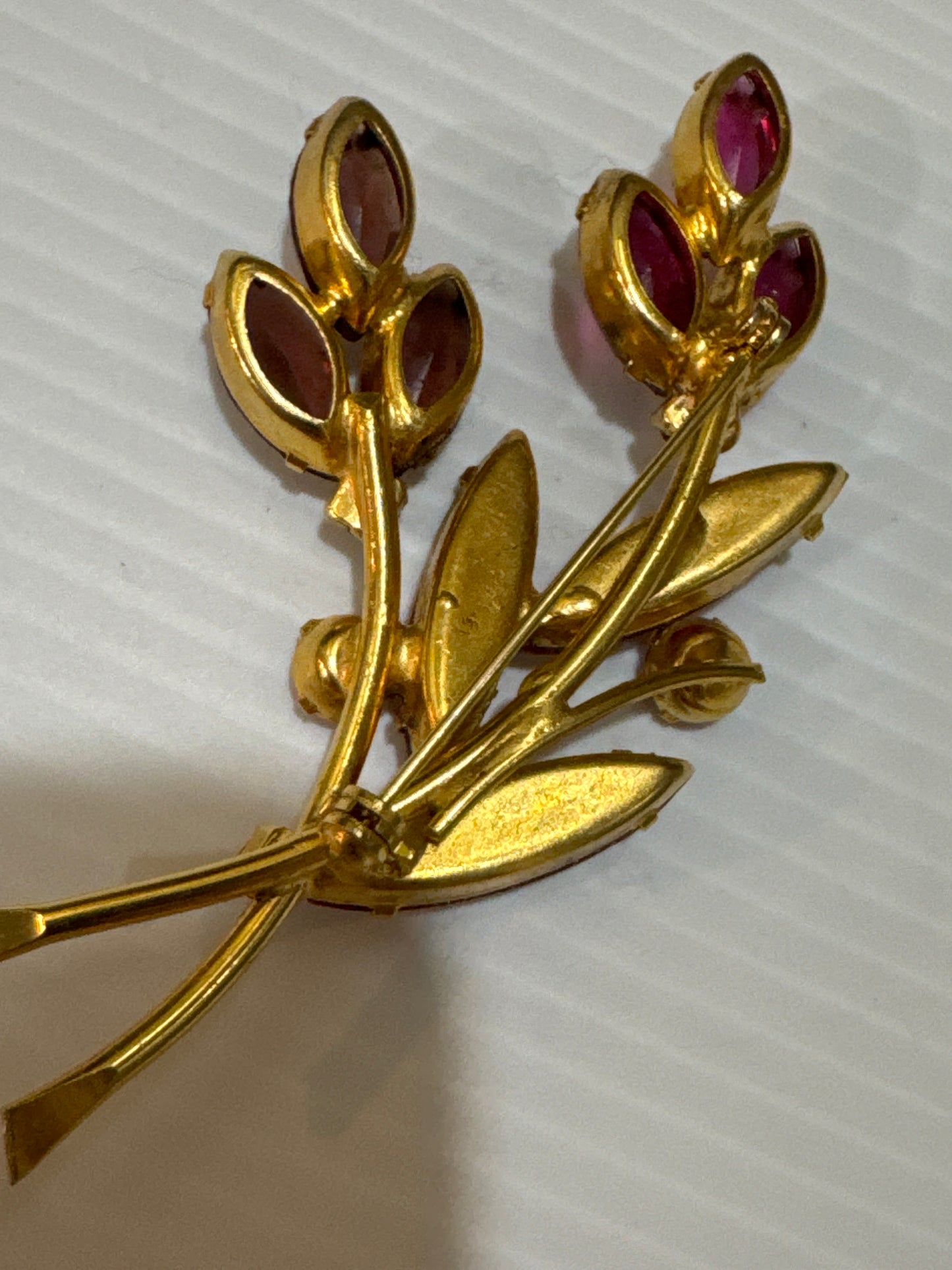 1950s beautiful red, fuchsia and amethyst colored glass rhinestone brooch. Jackpot.