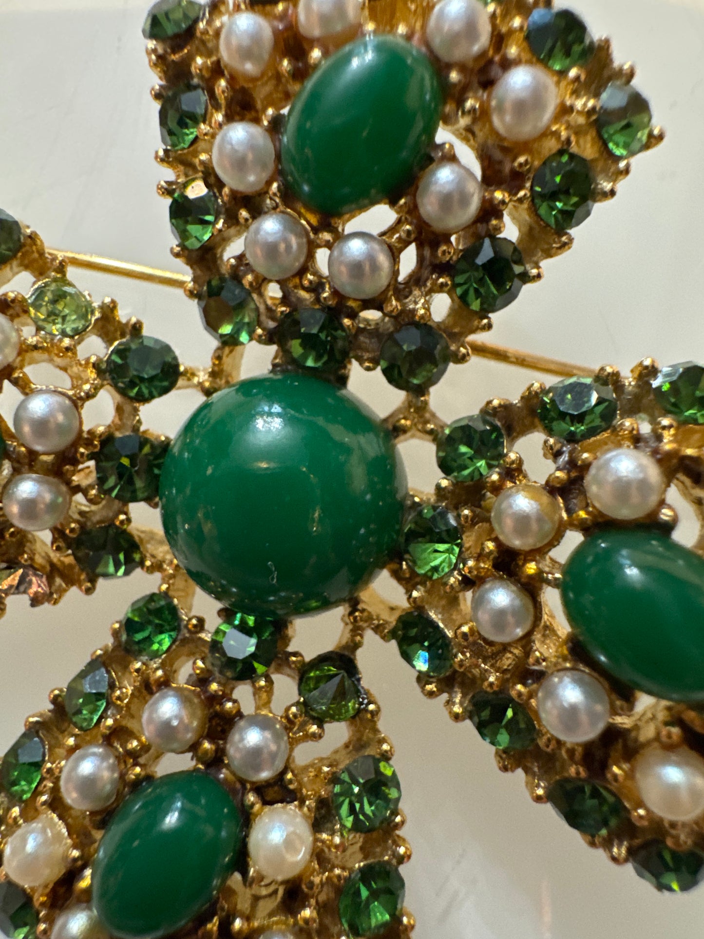 Beautiful WEISS Maltese cross with green cabochon stones, rhinestones, and pearls. NYC