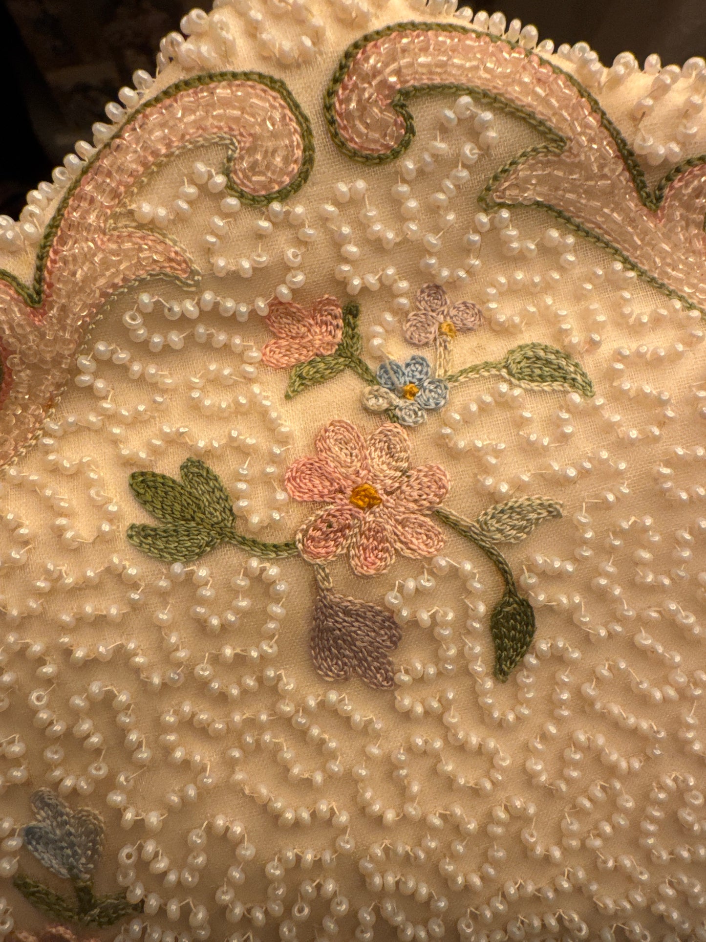 stunning vintage white beaded clutch bag with kiss lock, petite pointe flowers. Sourced in Paris.