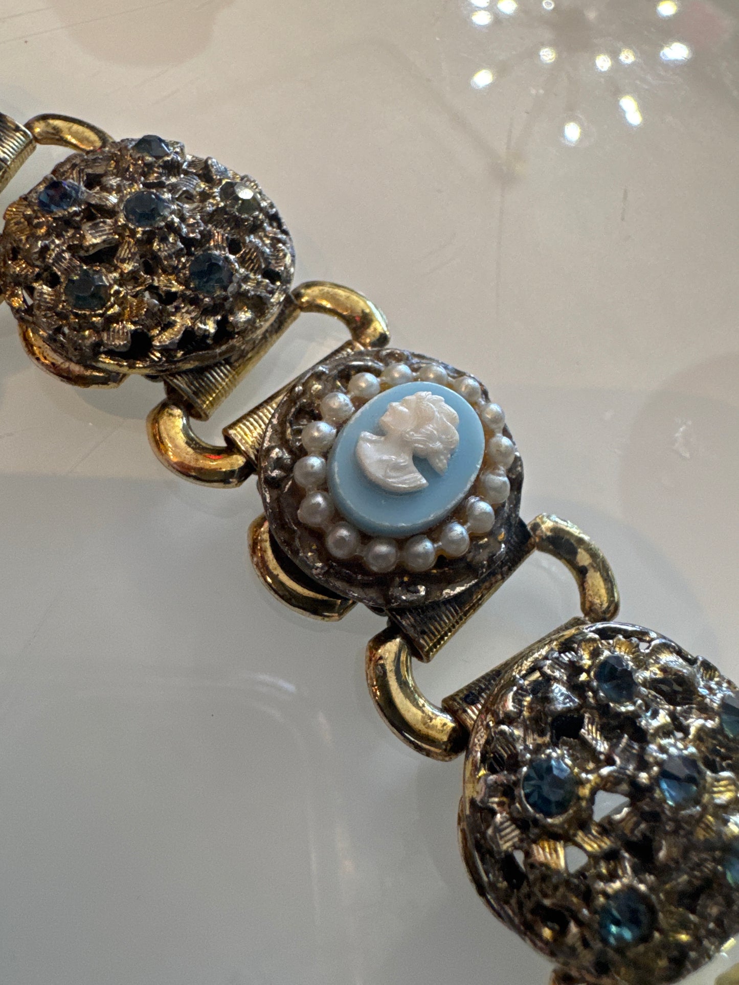Beautiful vintage gold tone, rhinestone, and blue cameo link bracelet