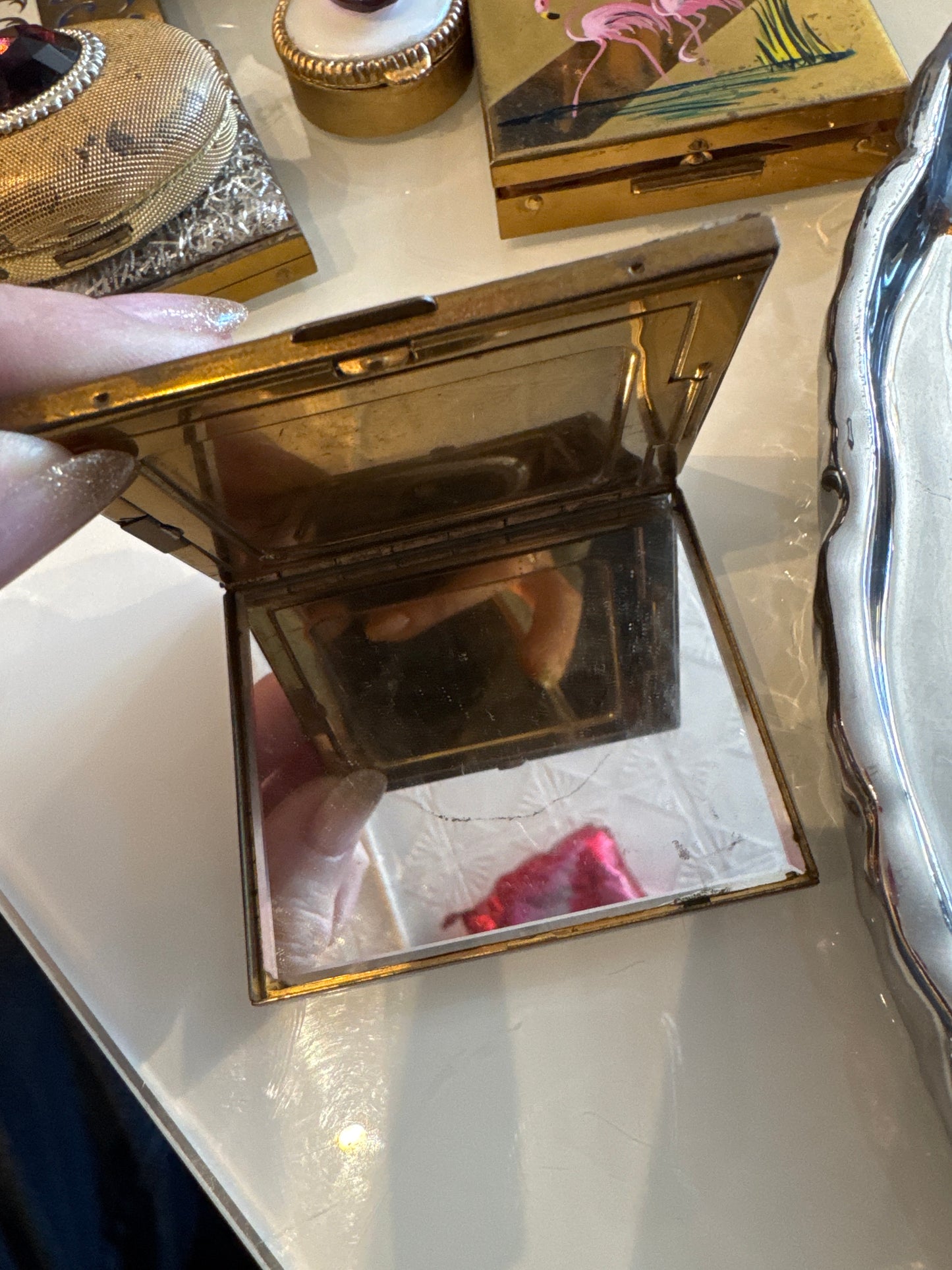 vintage enamel, black powder makeup compact with pink rosette's