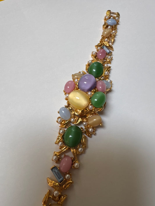 Vintage 1970s pastel cabachon bracelet. But guess what there's a secret watch. Does it work? That is the question ❤️