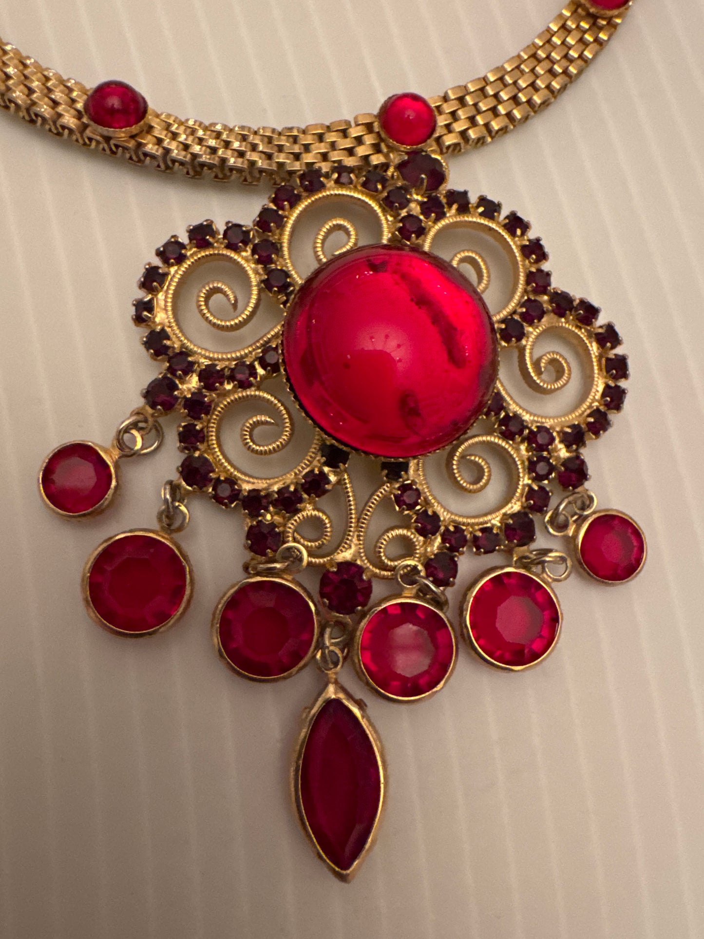 stunning gold tone and red rhinestone choker pendant. PARIS LIVE