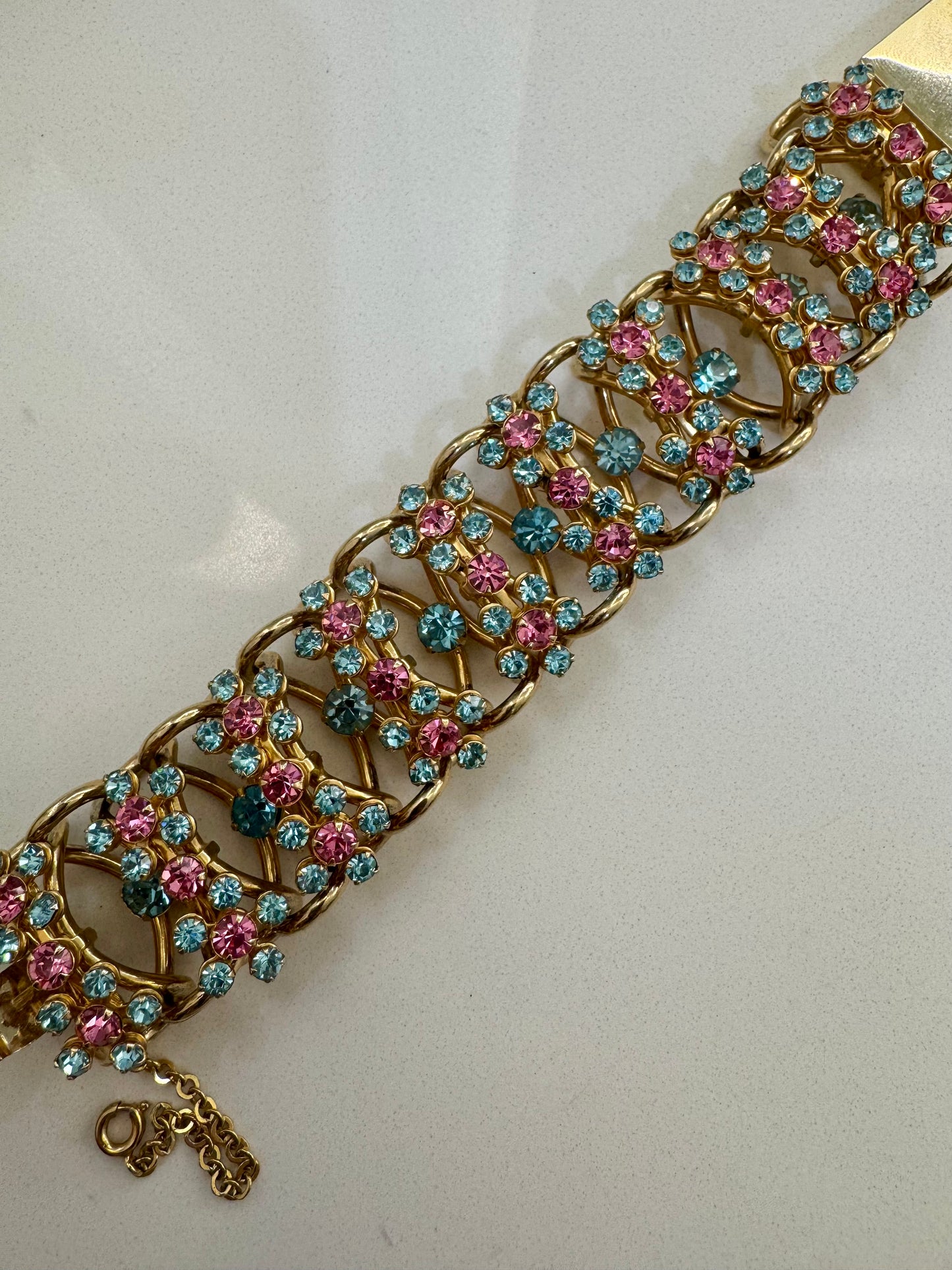 Gorgeous Vintage Juliana goldtone bracelet with blue & pink rhinestones. Oscar worthy!