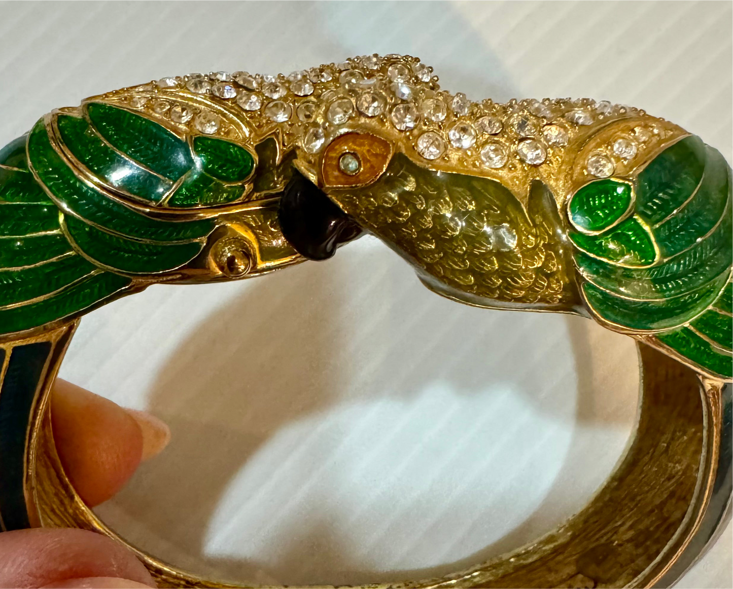 Amazing rare vintage signed Nolan Miller, enamel and rhinestone parrot, clock clamper bracelet