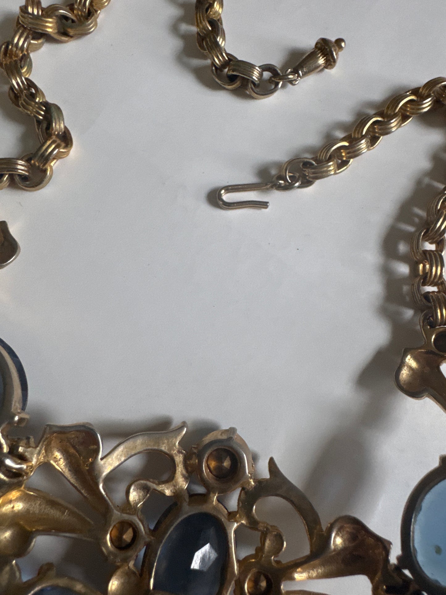 Absolutely gorgeous 1930s signed Schiaparelli necklace featuring shades of blue glass beads with tassel dangle, and J clasp closure