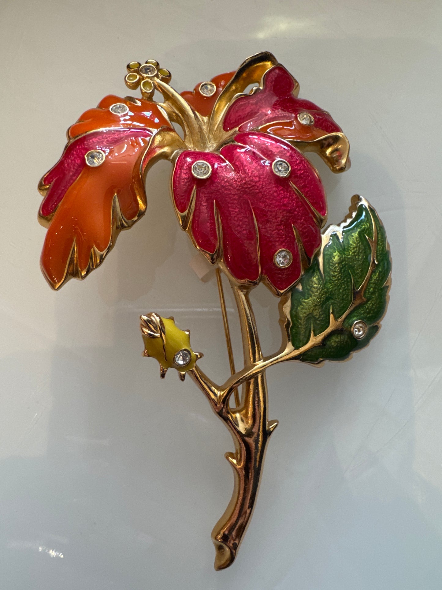 jumbo vintage Jose BARRERA flower brooch made specially for Avon. In gold tone, enamel, and clear rhinestones.
