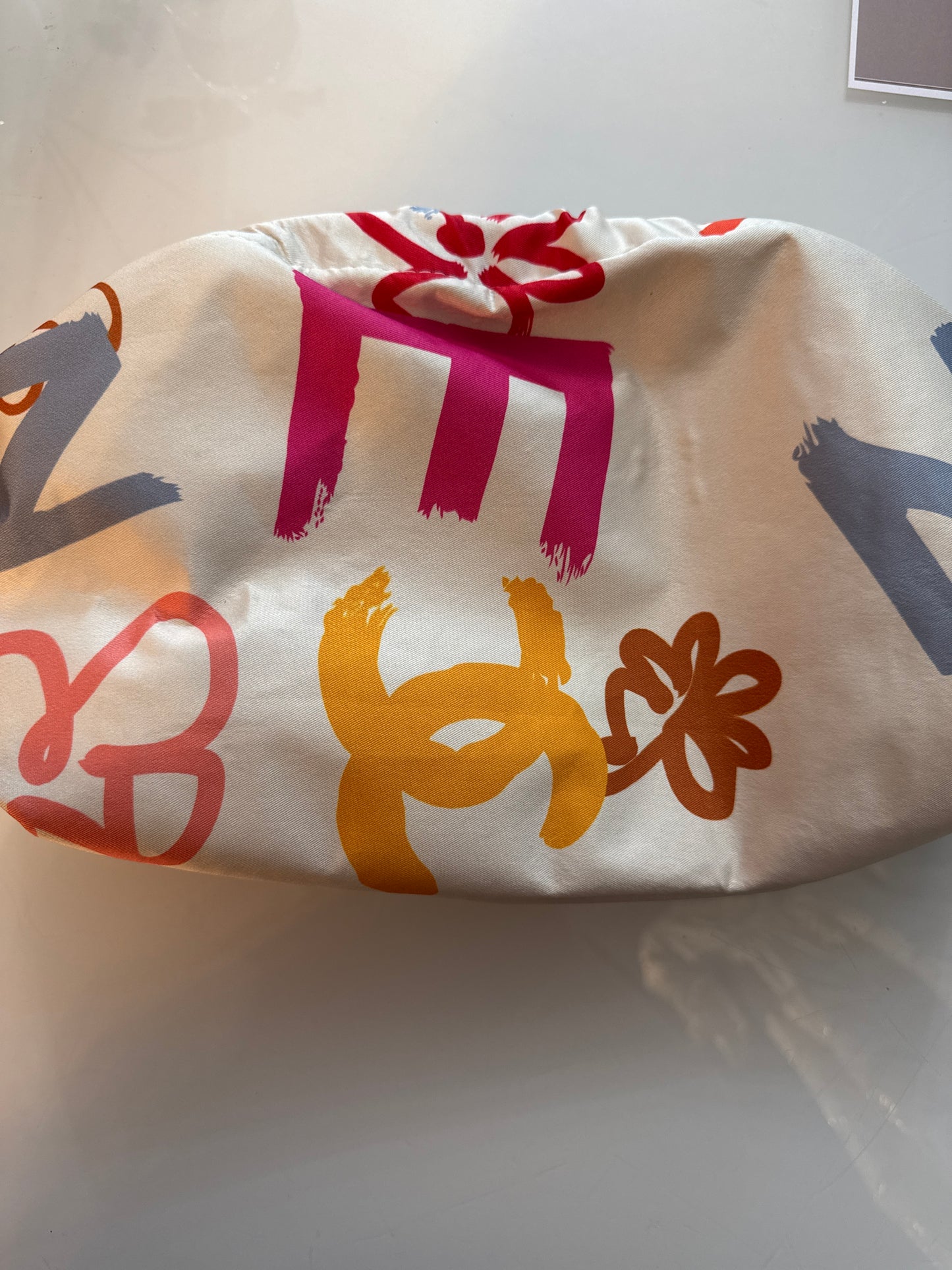 Designer silk scarves reimagined as Crossbody/clutch bags. Size large.