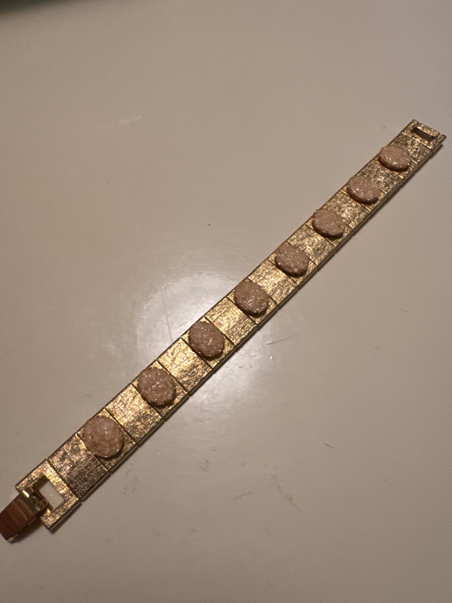 1960s Lavastone gold tone with mesh backing bracelet. measures 7 1/2 inches