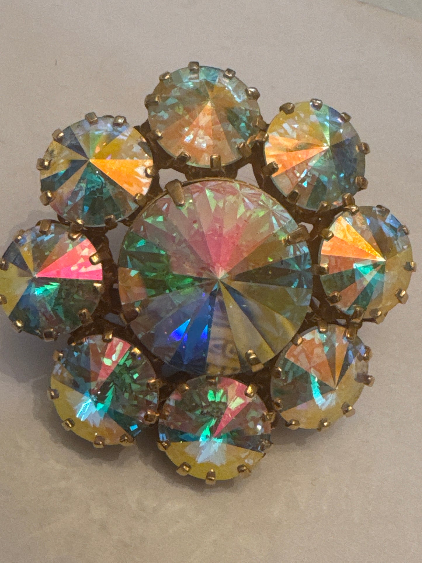 Stunning 1940s watermelon stone flower brooch. Sourced in Paris.