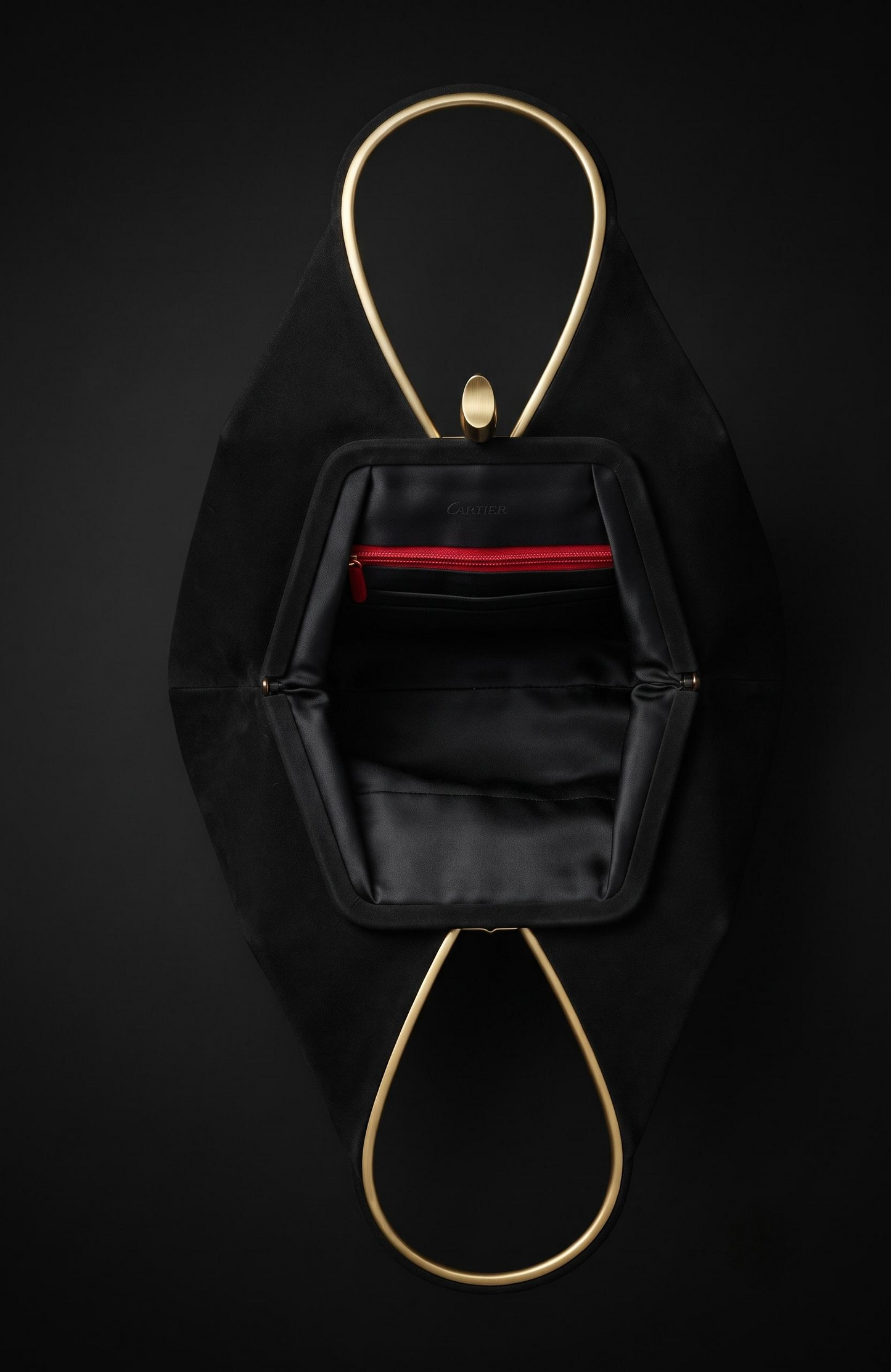Geometric suede Bag from the 1940s with gold-tone details, it is black.