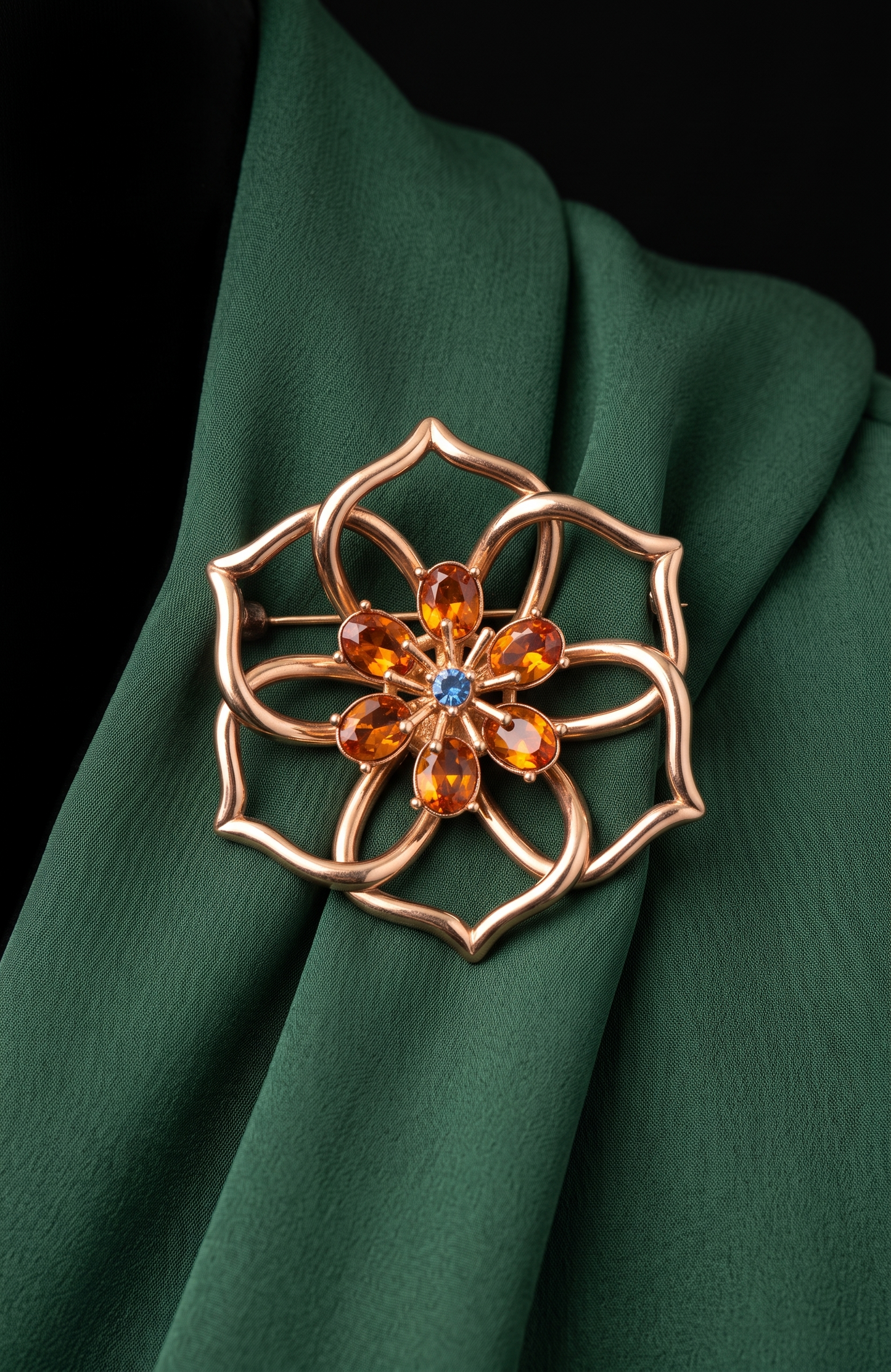 Vintage Weingeroff gold tone flower brooch/pendant with orange and blue glass rhinestones